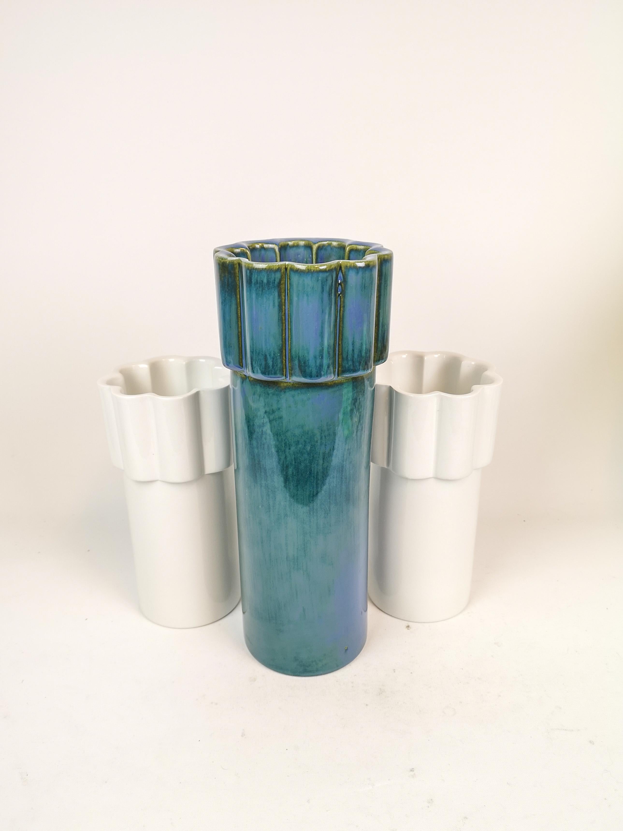 Three wonderful vases, manufactured by Gustavsberg Sweden in the 1960s, designed by the very talented Karin Björquist. The vases have a beautiful form and the glaze is amazing. The blue green gives a nice shine. 

Very good condition.