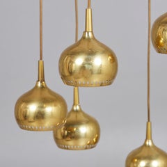 Scandinavian Modern Set of 6 Pendant Perforated Brass Lamps, 1960's