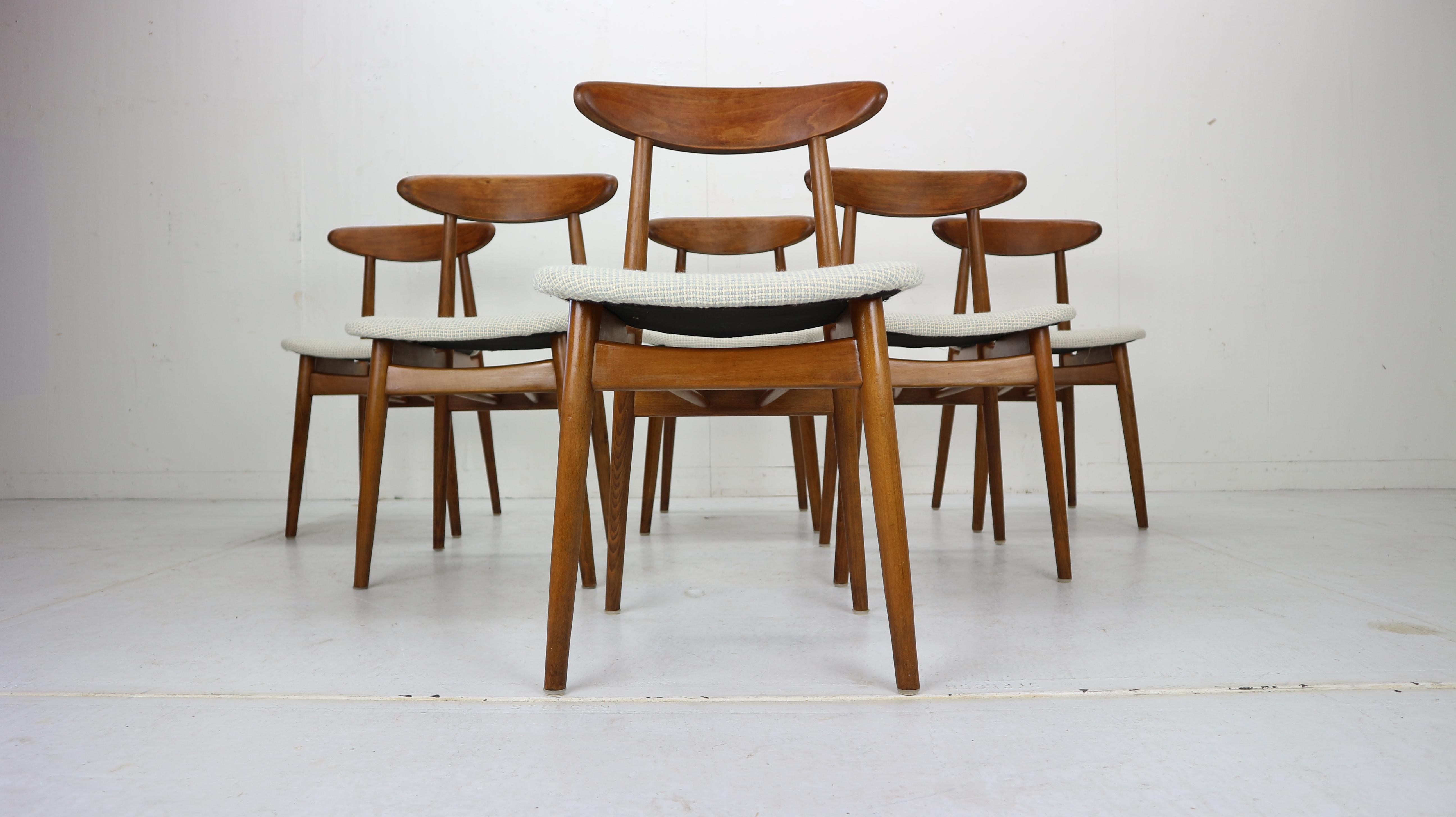 Scandinavian Modern period elegant set of six dining room chairs designed and manufactured in early 1960s period, Denmark.
Curved teak backrest of the chairs gives a comfortable feeling.
The seating of the chairs has been newly upholstered with