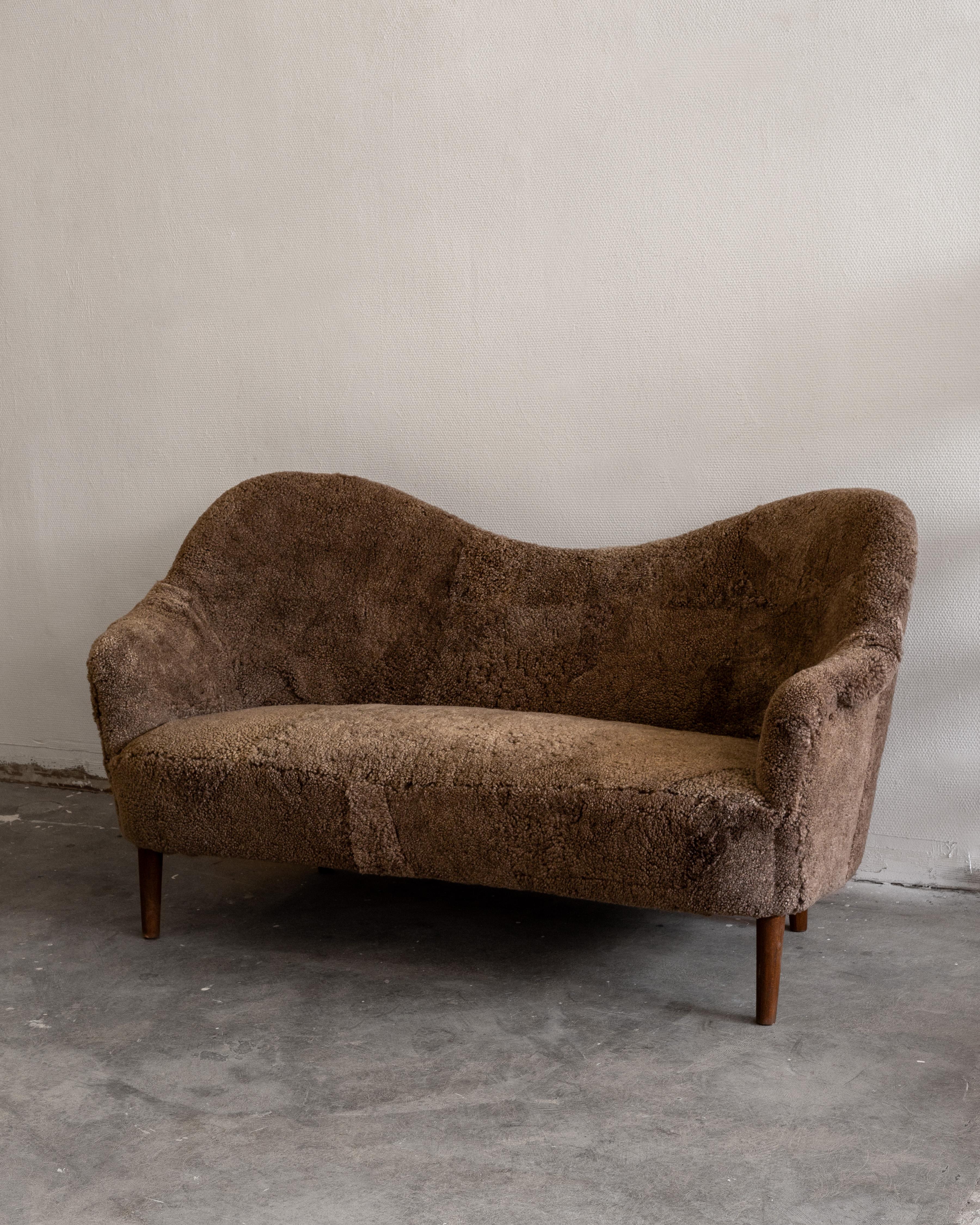 This exquisite sofa is a prime example of Scandinavian Modern design. Named 
