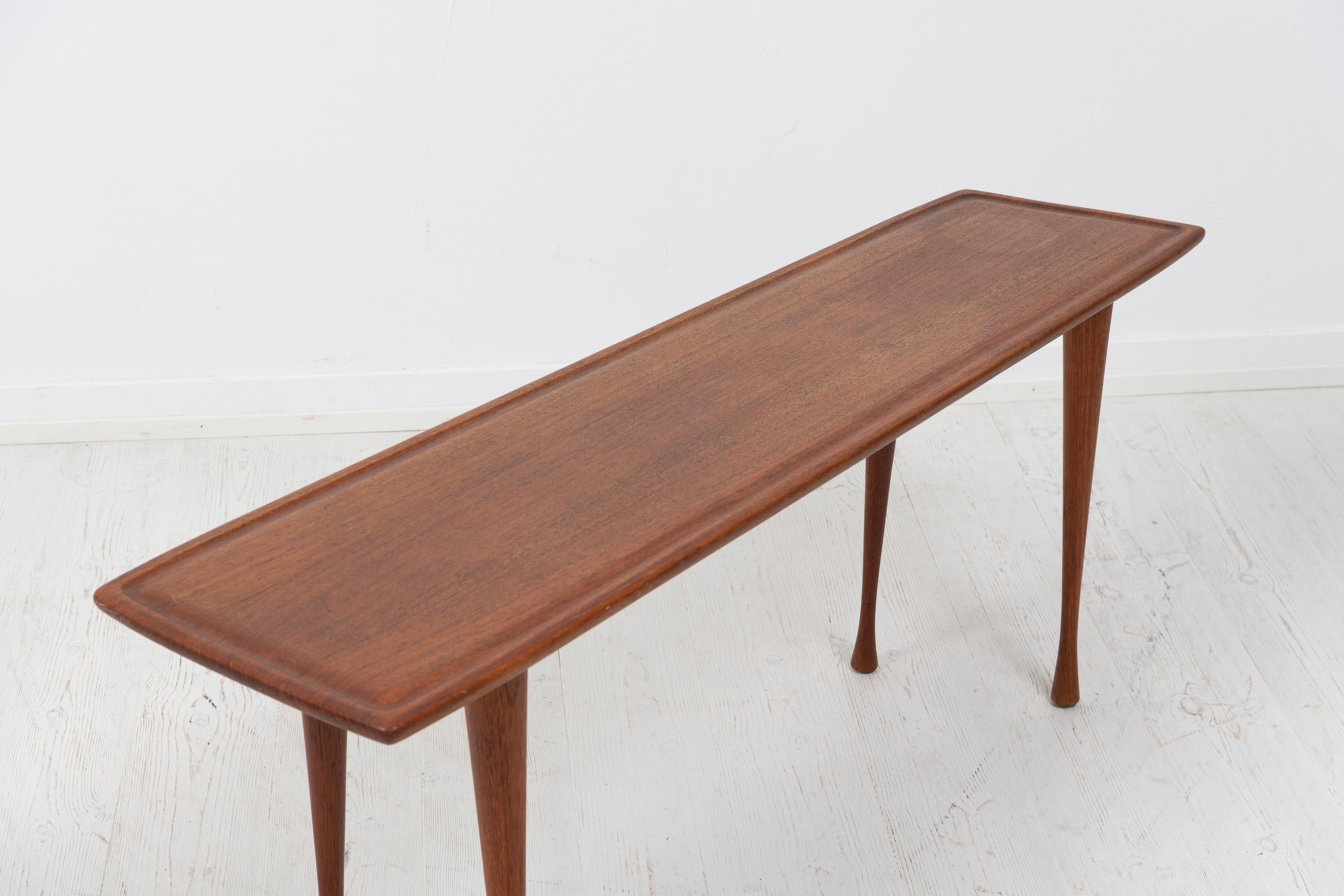 Scandinavian Modern Slender Danish Teak Table For Sale 1