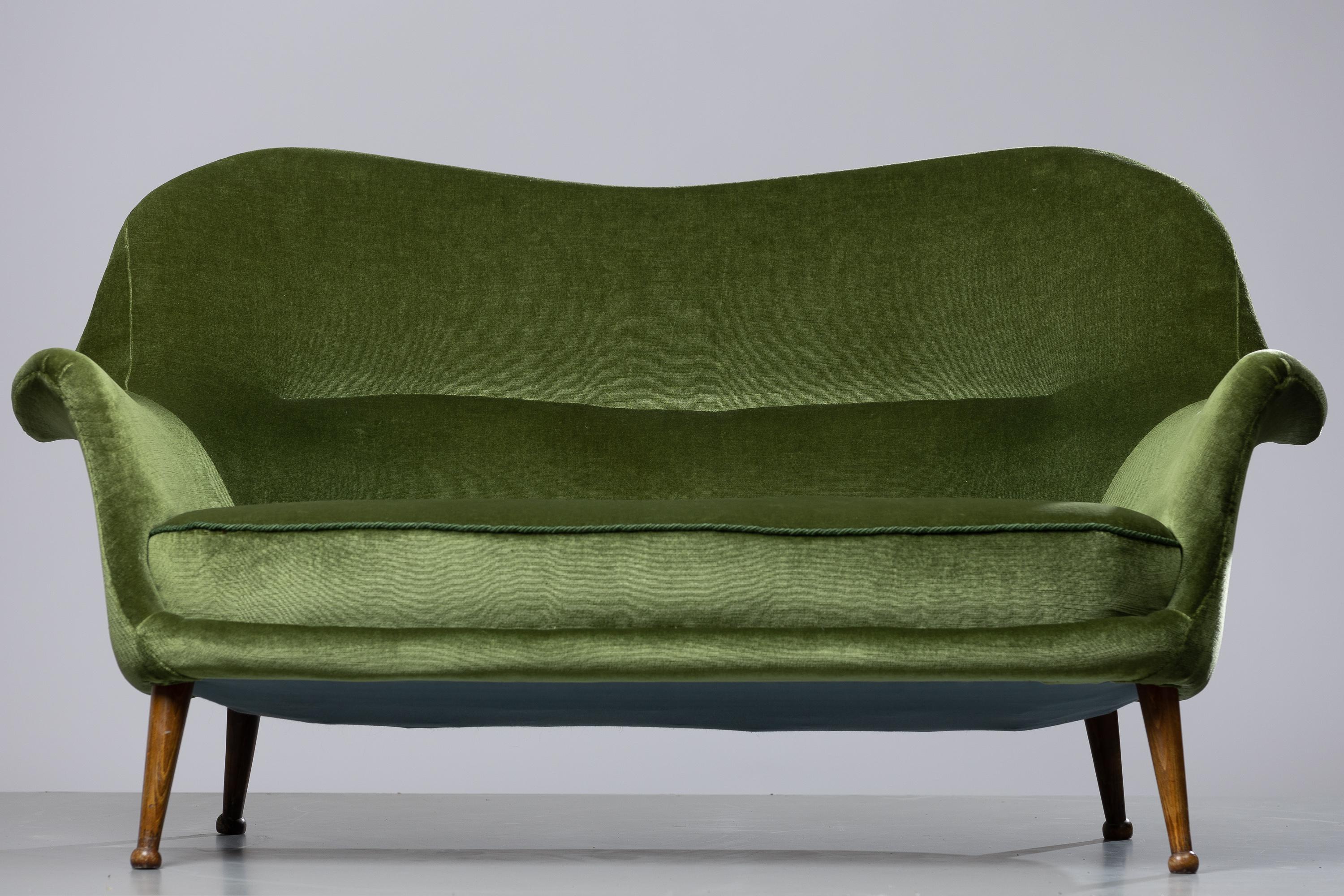 Experience the iconic Scandinavian Modern sofa, the 