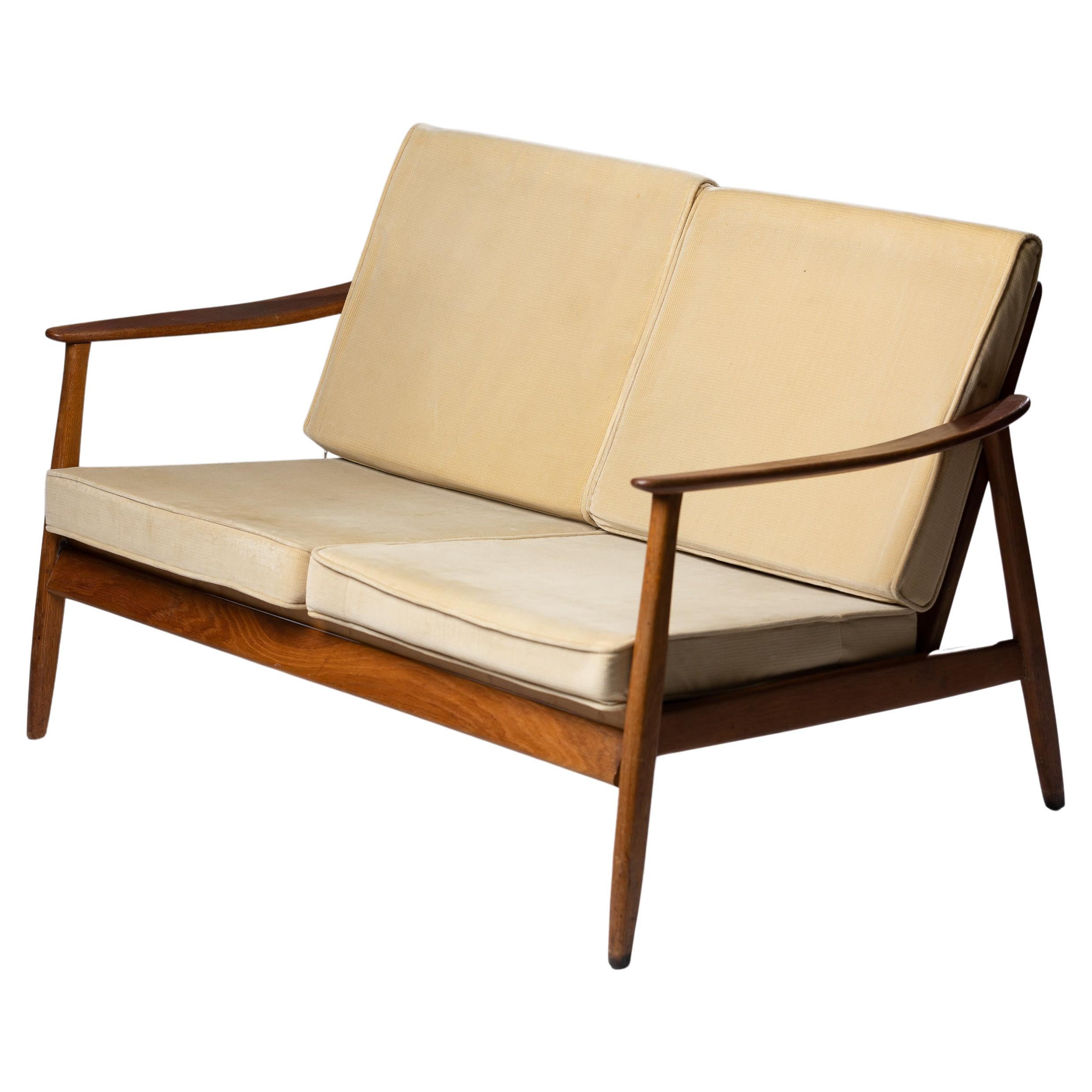 Skandinavisches modernes Sofa von Folke Ohlsson aus Rattan und Teakholz