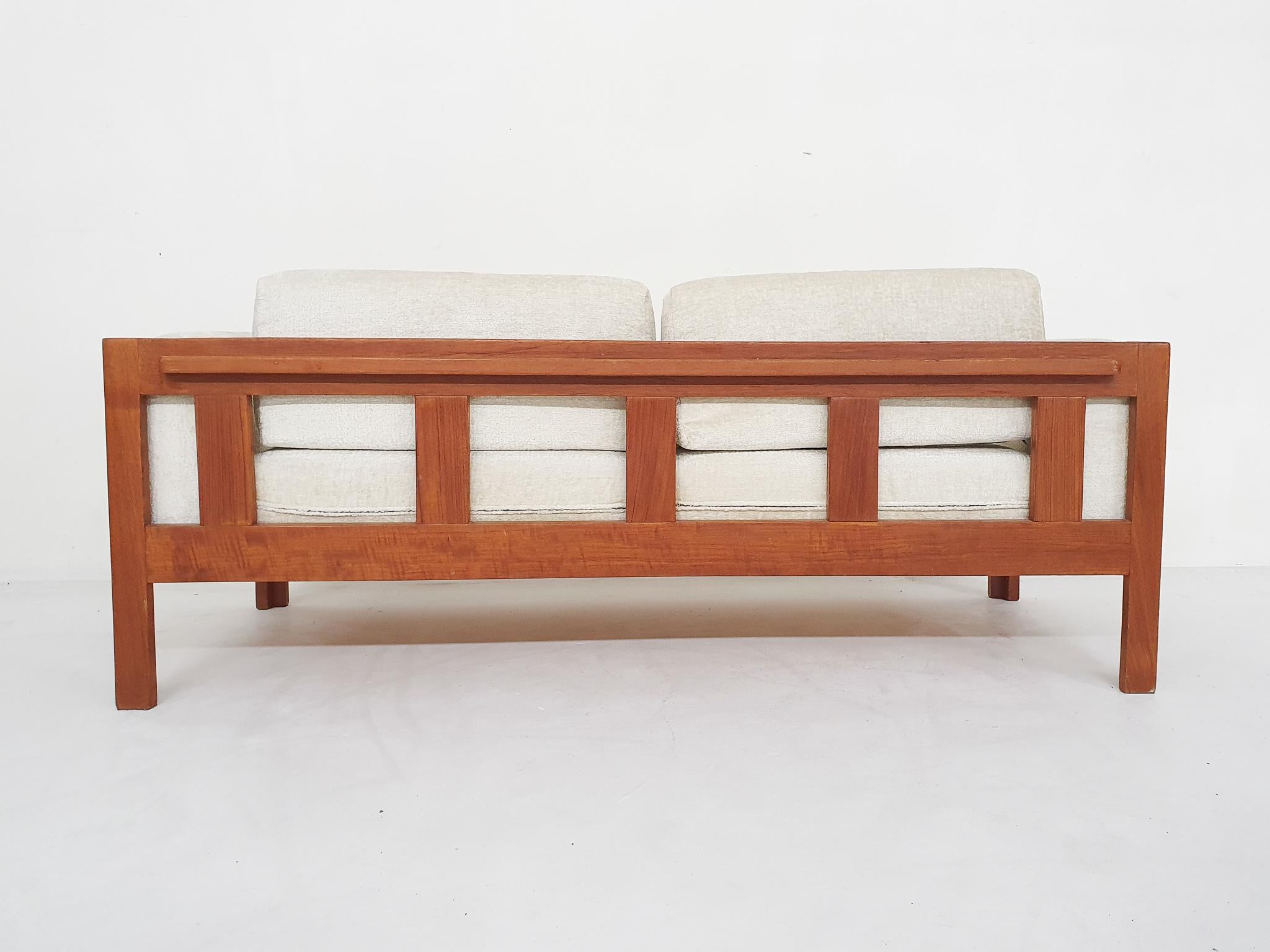 Mid-20th Century Scandinavian modern sofa in teak and boucle, 1960's For Sale