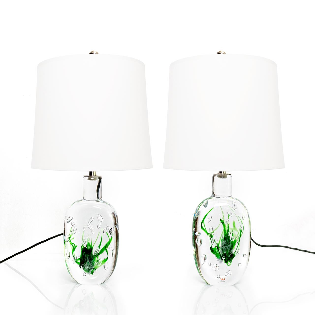 Hand-forged solid crystal table lamps with decorative bubbles and abstract green designs. Newly rewired with nickel plated hardware including a three-way Edison base socket, and silk cord. 

Measures: Total height 21”, body heigh 10 “, body width