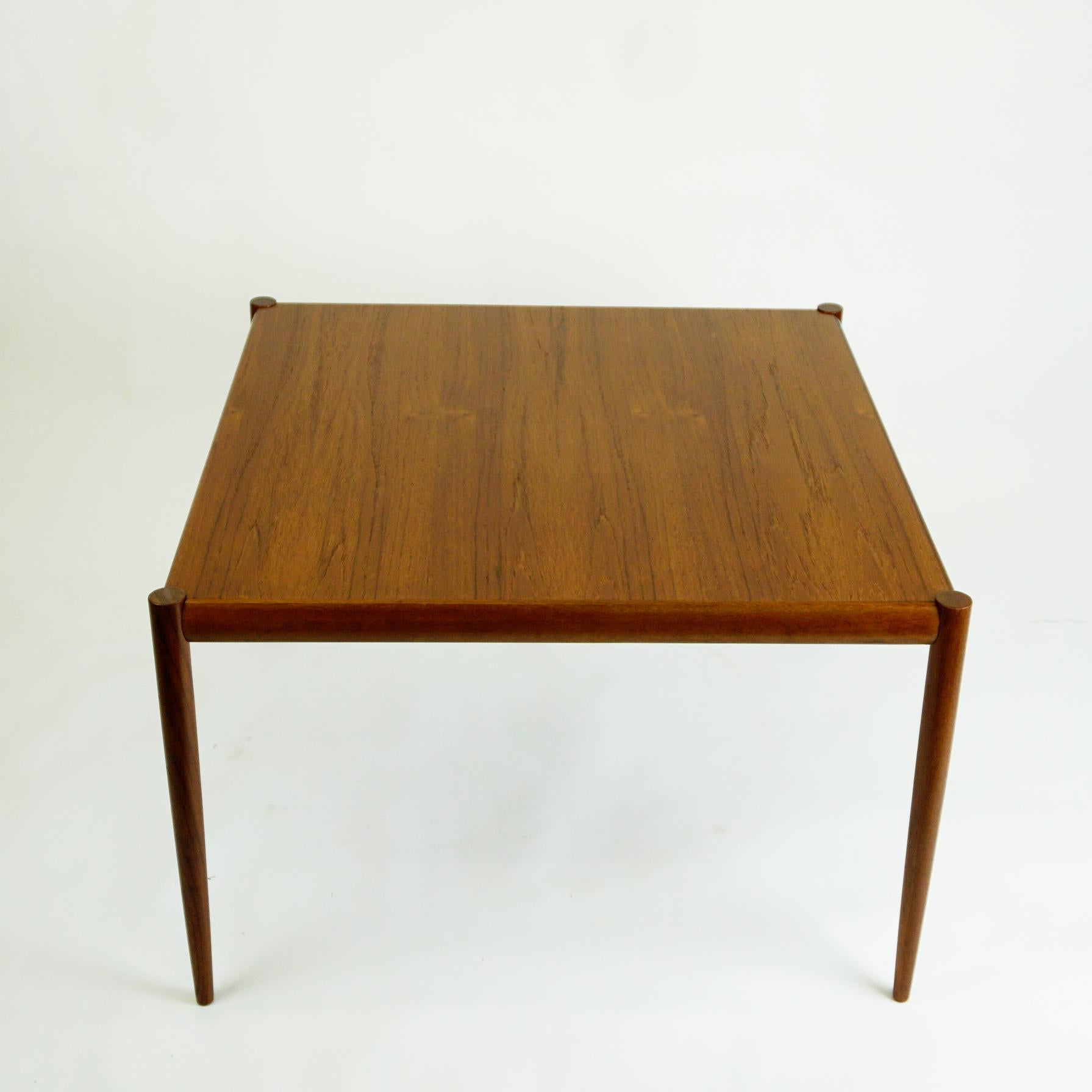 Beautiful handcrafted Scandinavian Modern square teak coffee table produced in Denmark in the 1960s, perfect addition to any Scandinavian Modern sofas, armchairs or easy chairs.
Marked Made in Denmark on the underside.