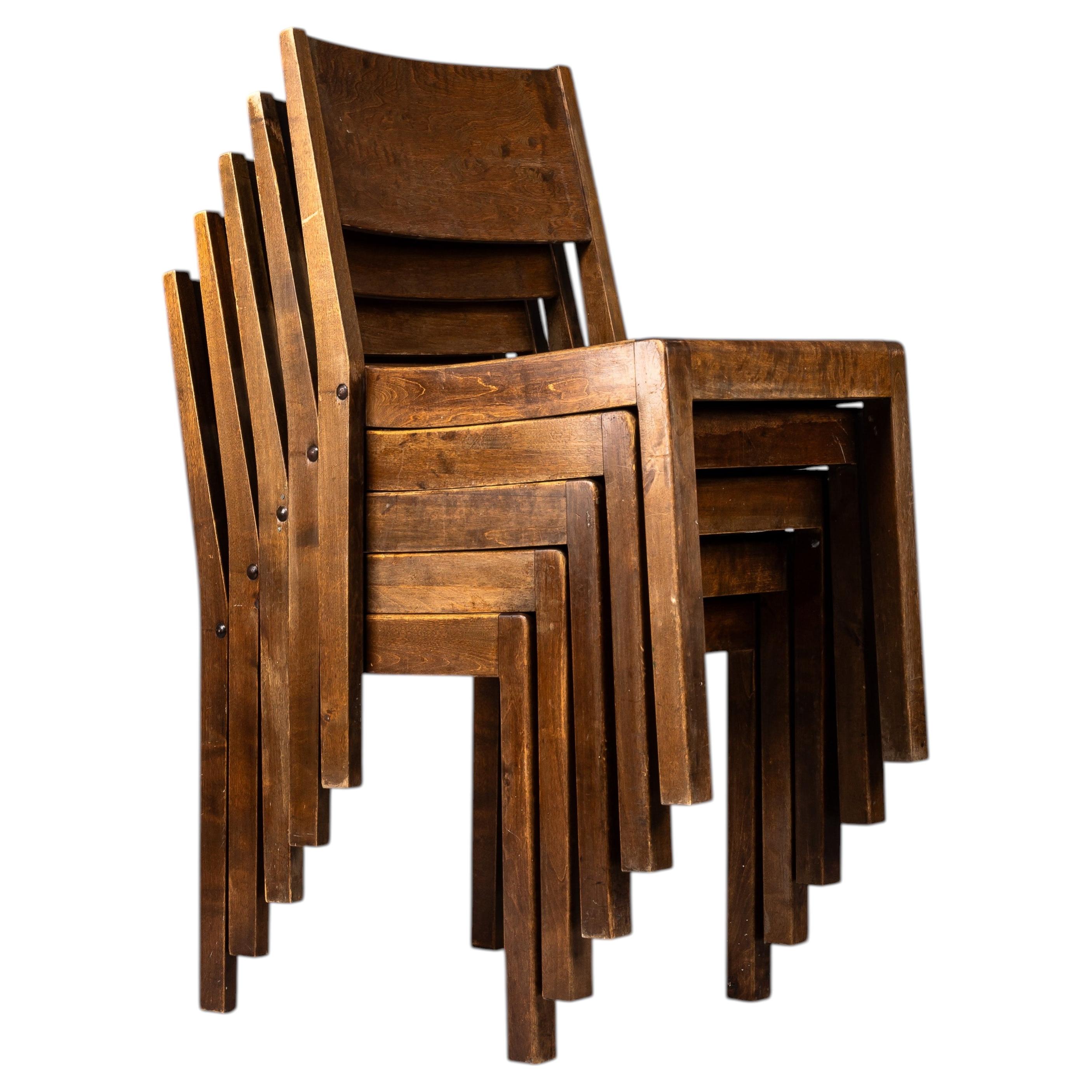 Scandinavian modern stackable 1930s stained birch chairs with great patina For Sale