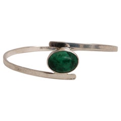 Vintage Scandinavian Modern Sterling Silver bracelet by Isaac Cohen with green stone.
