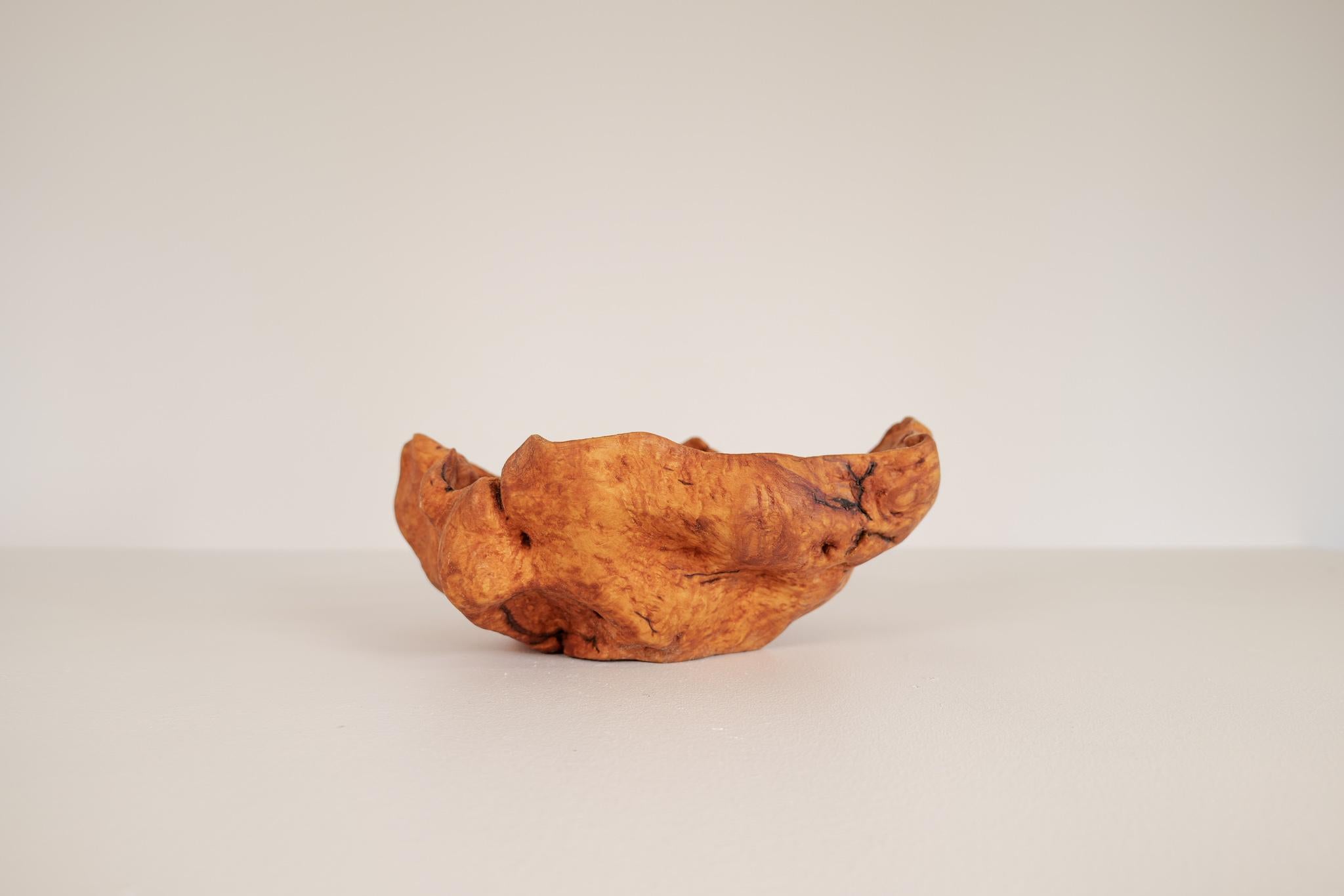 This large burl made in Sweden with precision handcraft gives a nice edition to any living room with intention to give an organic simple, but jet complex look. The signs of the wood structure and life are clearly visible. 

Good vintage