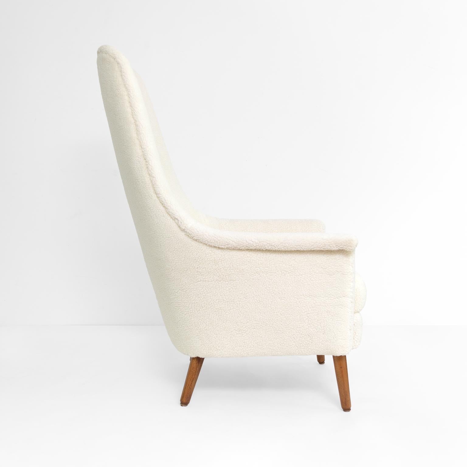Scandinavian Modern, Swedish high back lounge chair in faux sheepskin In Good Condition For Sale In New York, NY