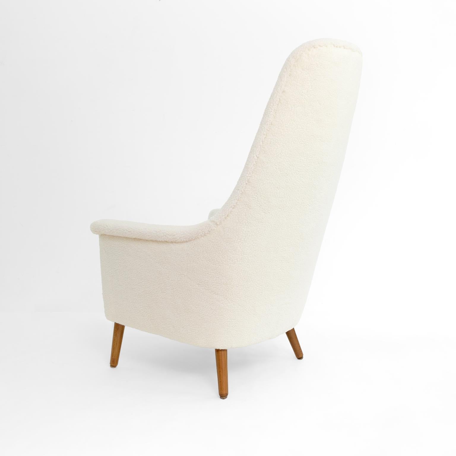 Scandinavian Modern, Swedish high back lounge chair in faux sheepskin  1