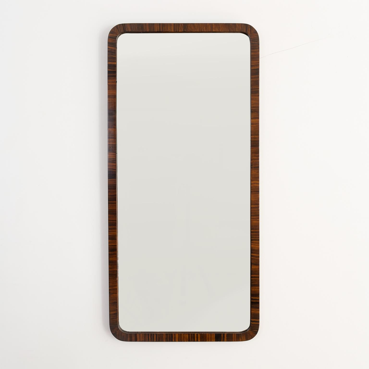 Scandinavian Modern, Swedish modernist, Minimalist mirror with rounded corners. The frame is expertly painted faux Macassar. Original 1930s frame and mirror glass. 

Measures: Height 42