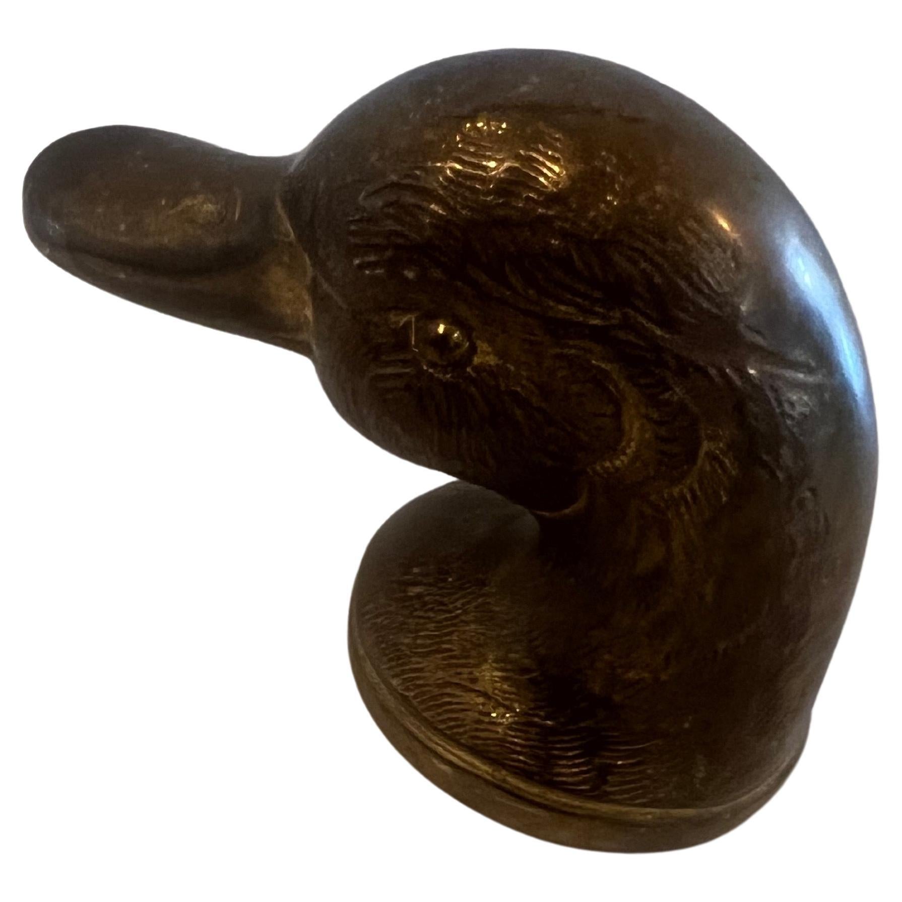 rare very collectible patinated brass Swedish duck brass bottle opener, circa 1940's.