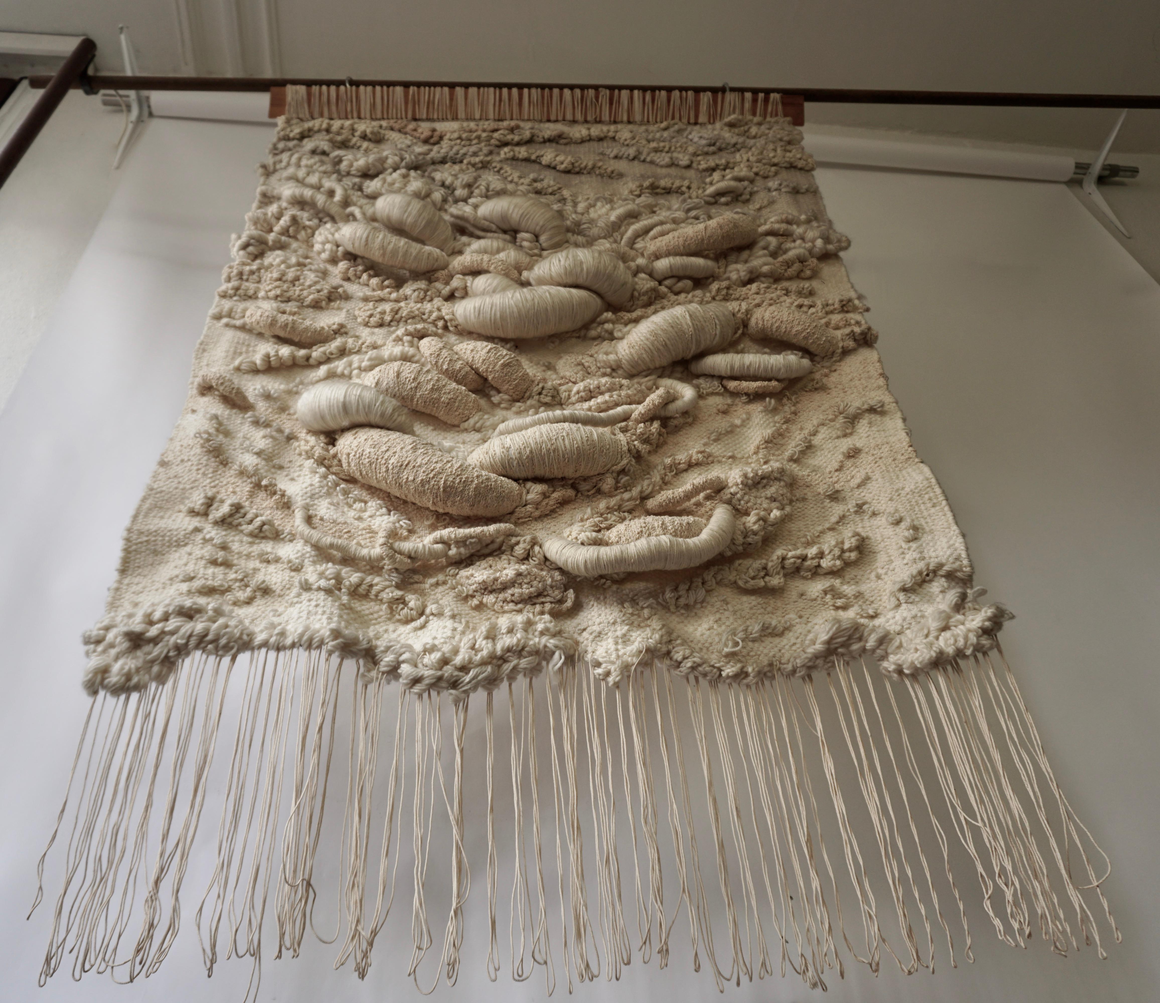 Scandinavian Modern Swedish vintage tapestry with warm earthy colors. This hand knotted wool vintage Swedish tapestry is rich in texture and will add much needed warmth to nearly any space.