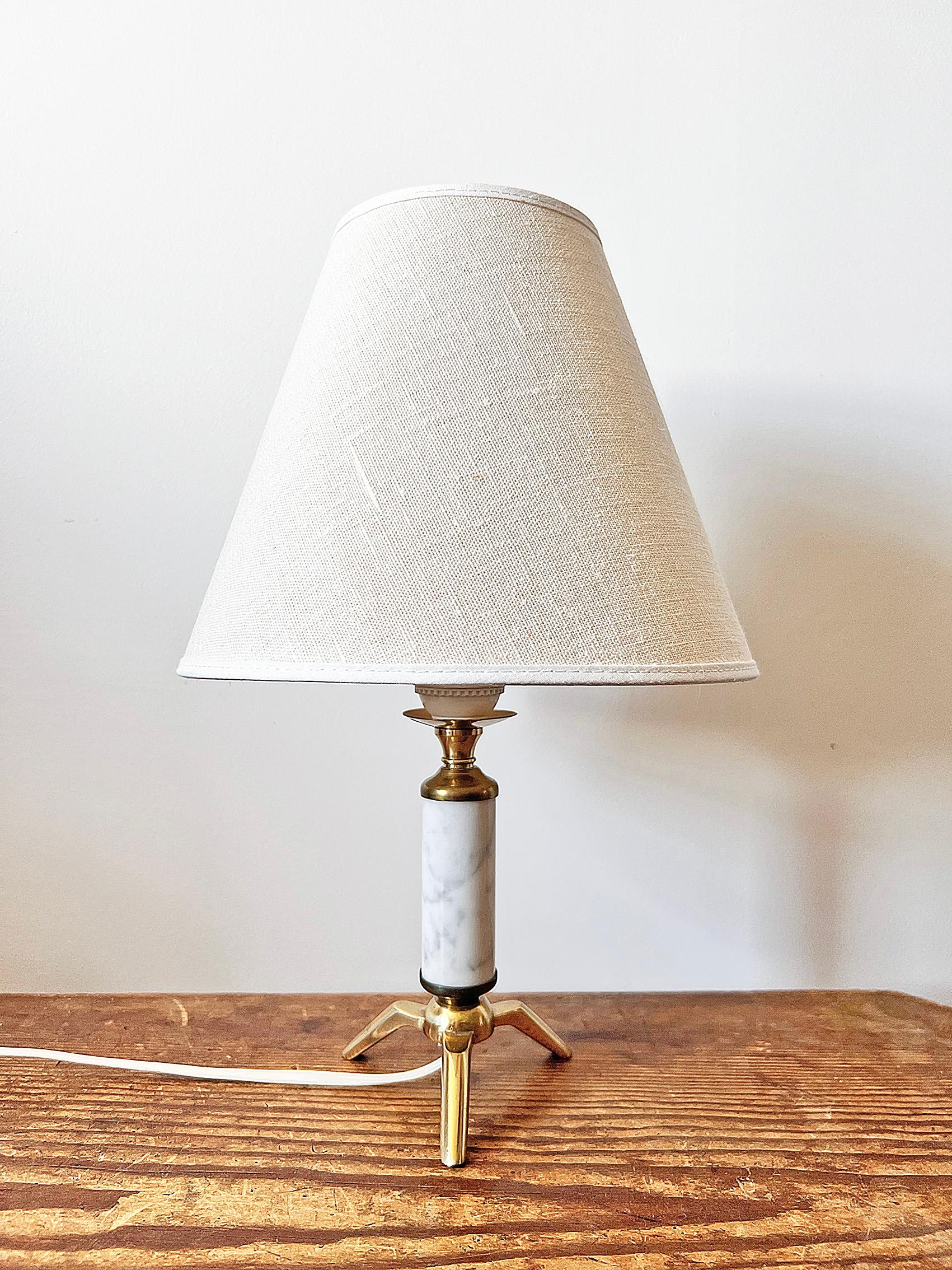 Rare little table lamp in brass and marble by Falkenbergs Belysning, Sweden, ca 1960 - 1970's.
Signed with makers mark.
Condition: wear consistent with age and use. Brass patina. Smaller marble chips on the base line (see last picture). The ring