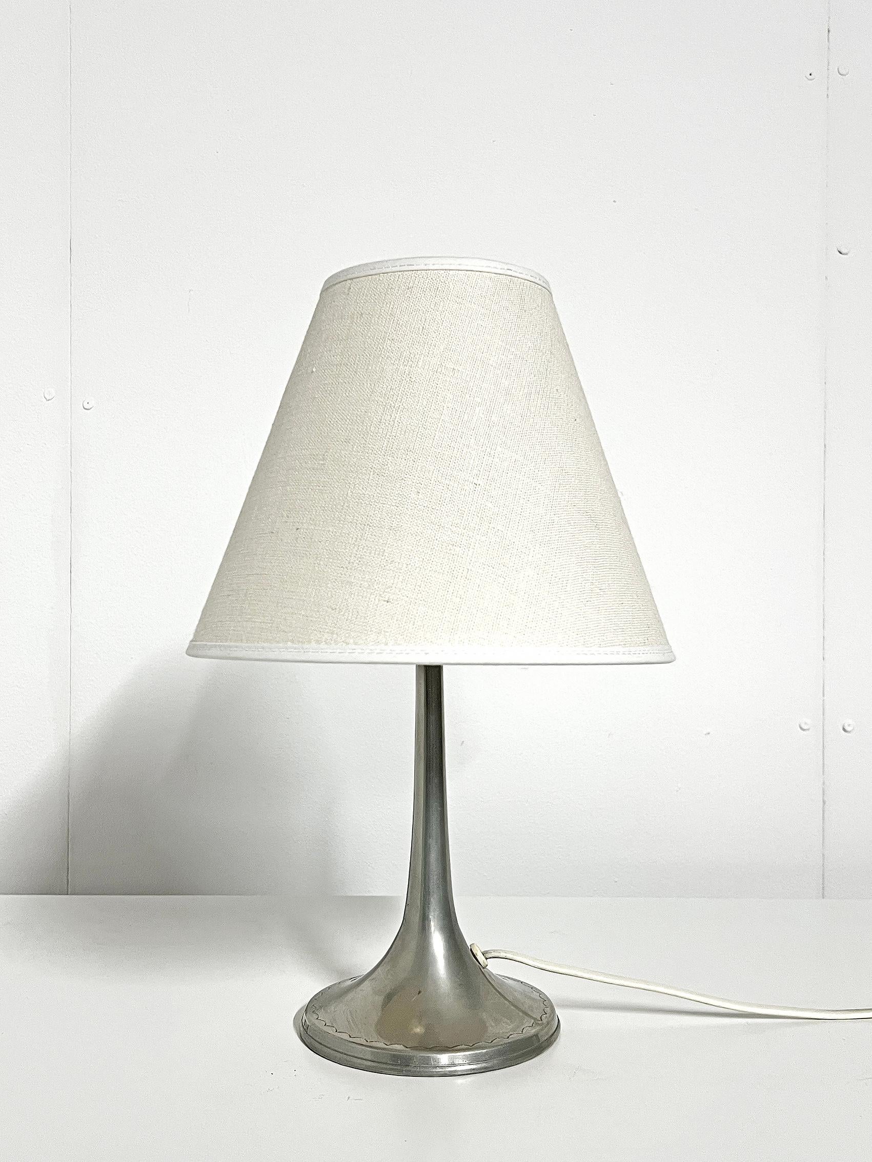 Rare, Scandinavian Modern table lamp in pewter by Thorild Knutsson -1930.
Marked with makers mark. 
Good vintage condition, wear and patina consistent with age and use. Scratches.
Please notice, the shade is not included!  
Original wiring. We