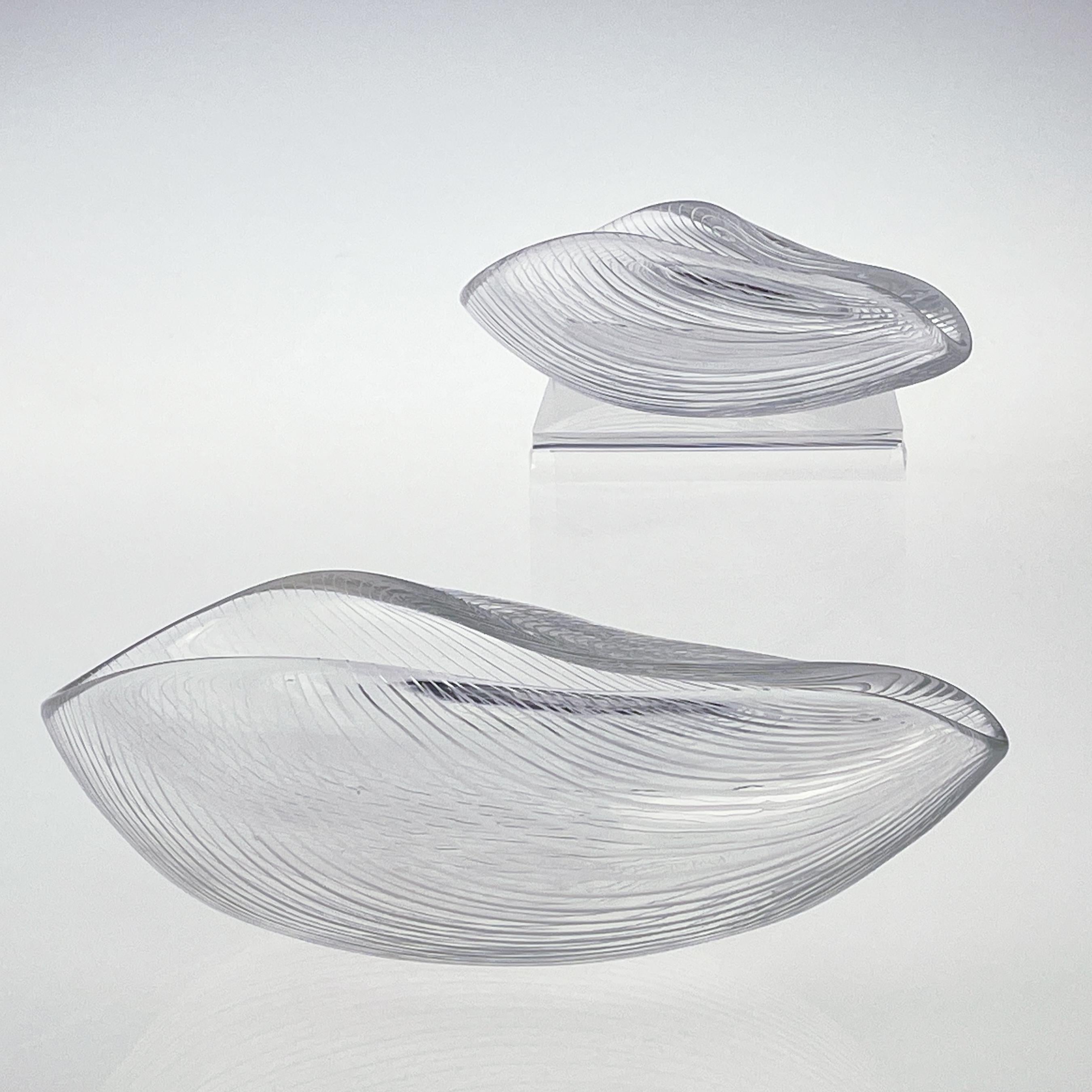 Scandinavian Modern Tapio Wirkkala Two Line Cut Crystal Art Bowls Handblown 

Two line cut, chair worked crystal art-object, Model 3342, expertly designed by the renowned Tapio Wirkkala in 1953. Crafted with utmost care by the skilled artisans of