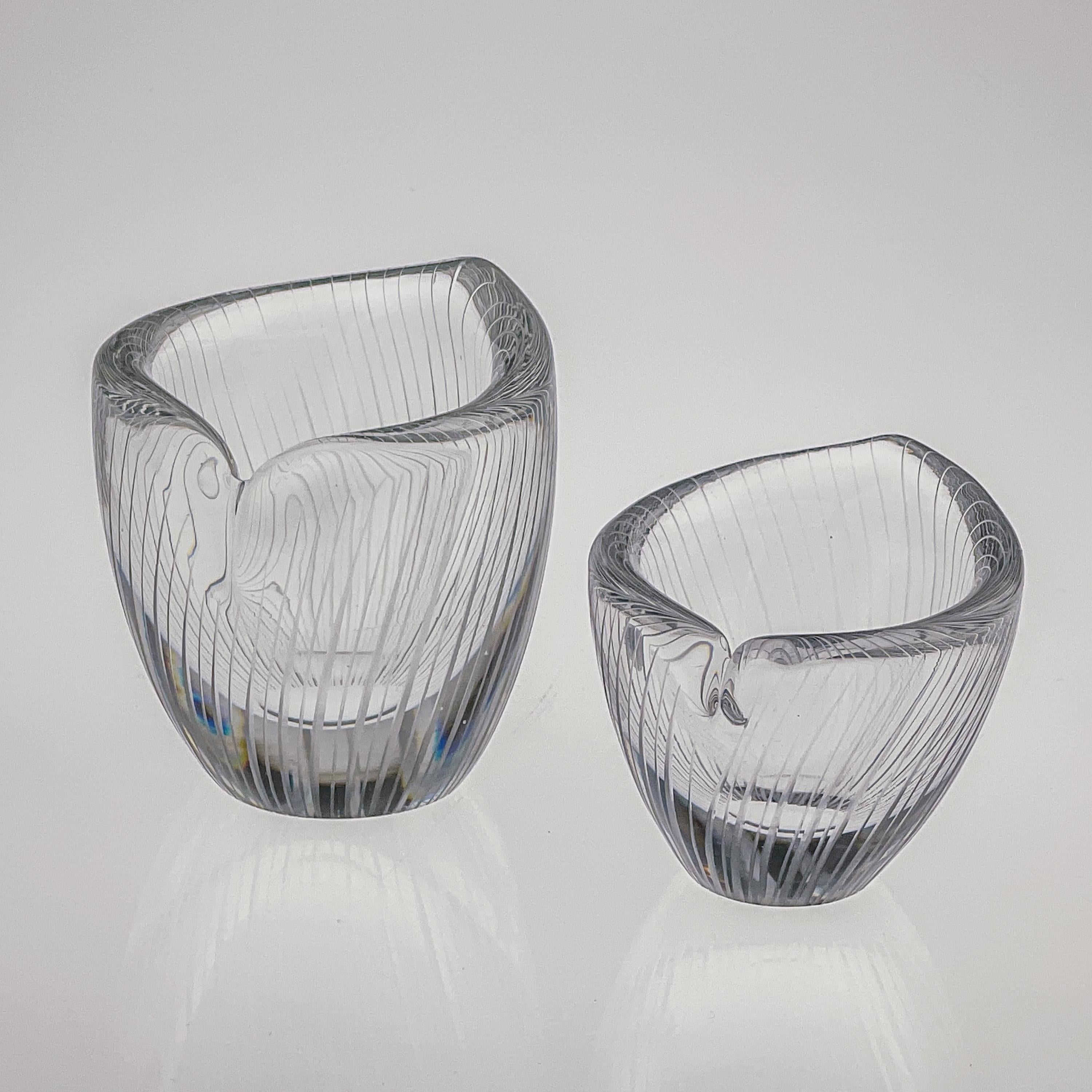 Scandinavian Modern Tapio Wirkkala Two Line Cut Crystal Art Objects Handblown 

Two freeblown crystal, line-cut art-objects, model 3132. Designed by Finnish artist Tapio Wirkkala in 1952 and executed by the Iittala Glassworks in 1954 & 1957.

These