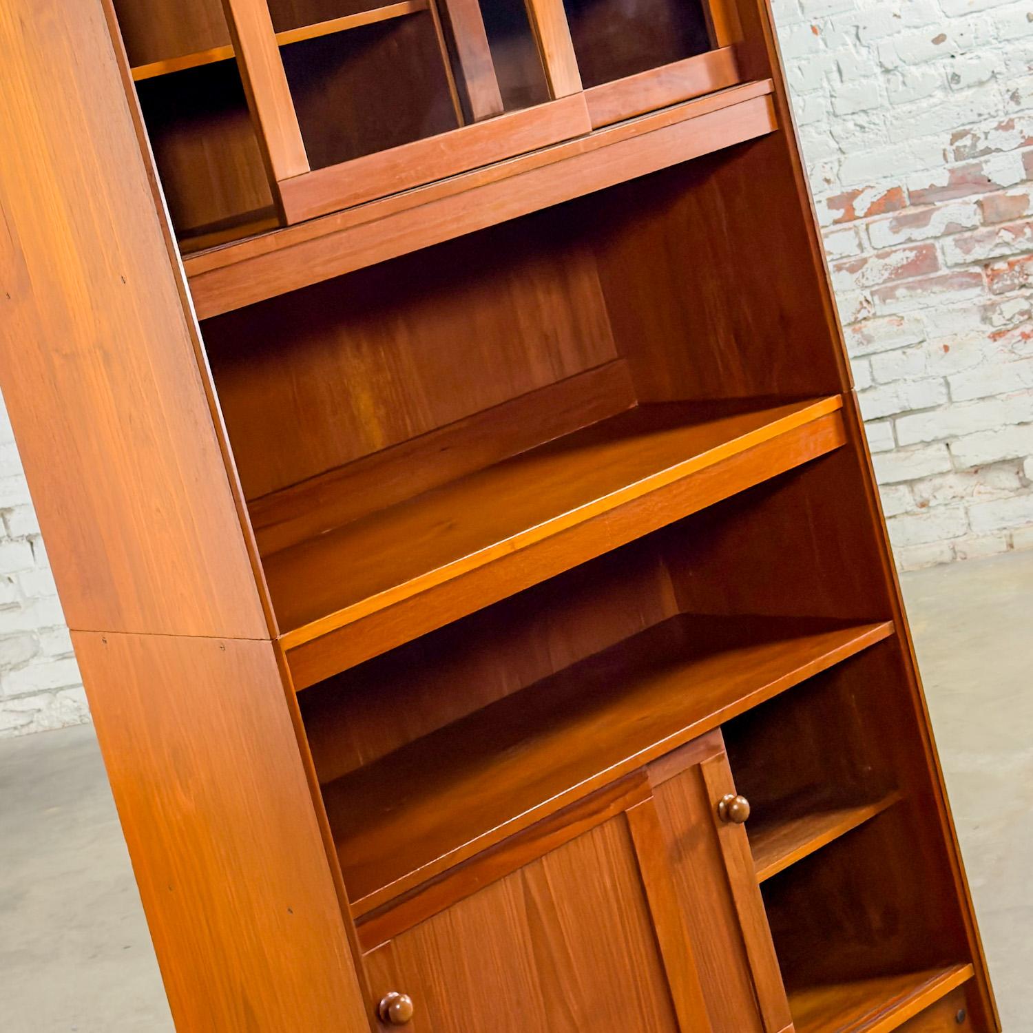 20th Century Scandinavian Modern Teak 2 Piece Display Cabinet or Bookcase Made in Denmark For Sale