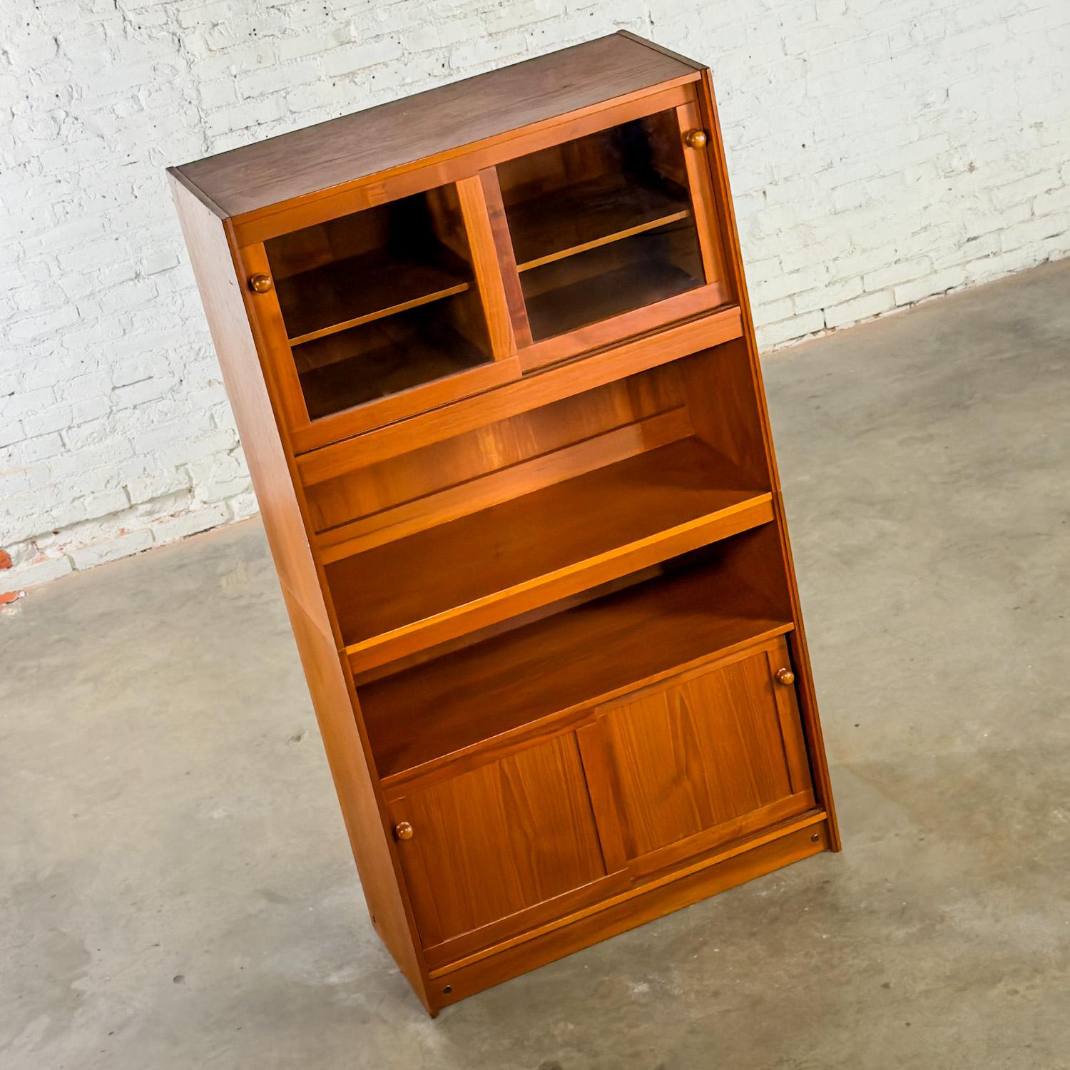 Glass Scandinavian Modern Teak 2 Piece Display Cabinet or Bookcase Made in Denmark For Sale