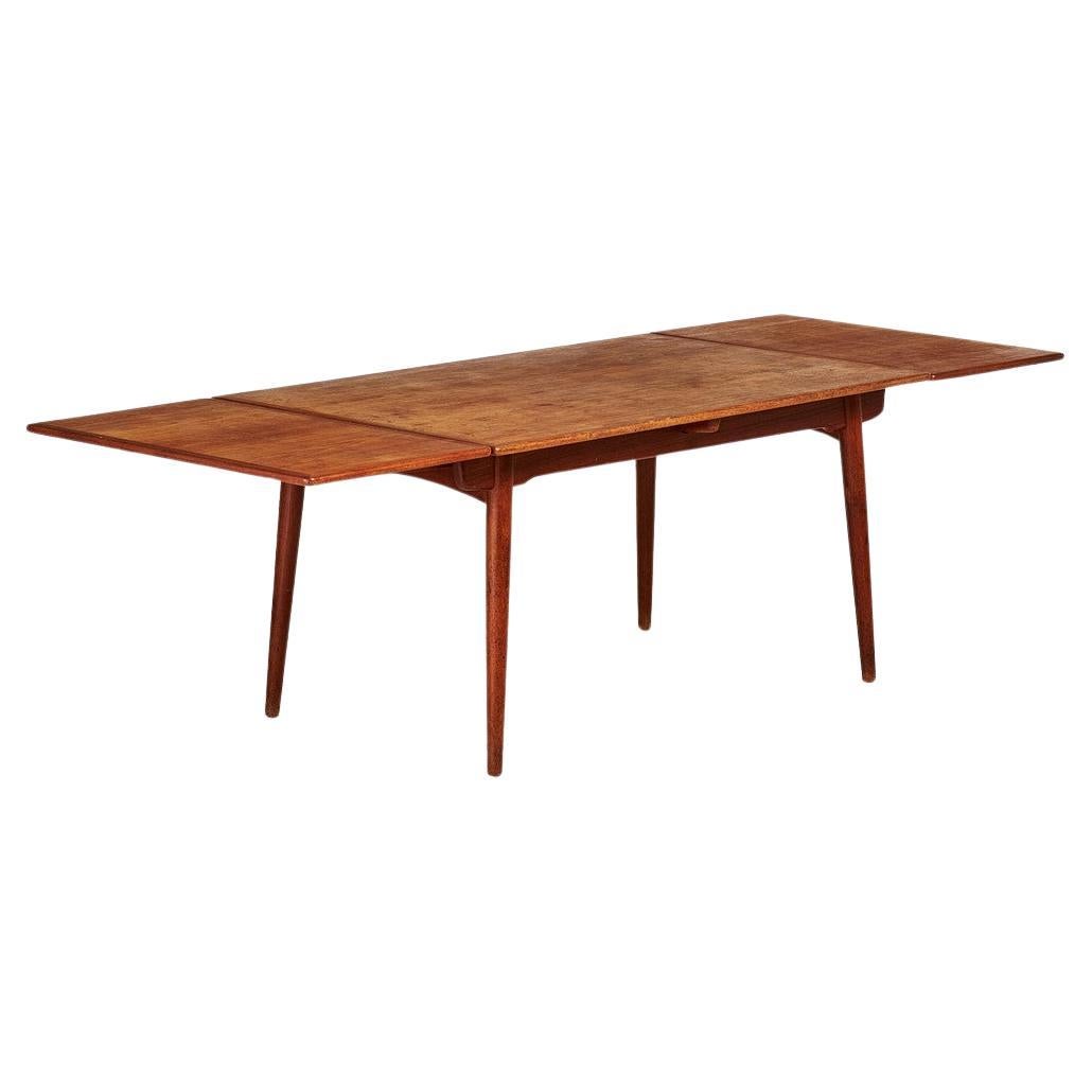 Scandinavian Modern teak and oak table from HANS J WEGNER AT312 For Sale