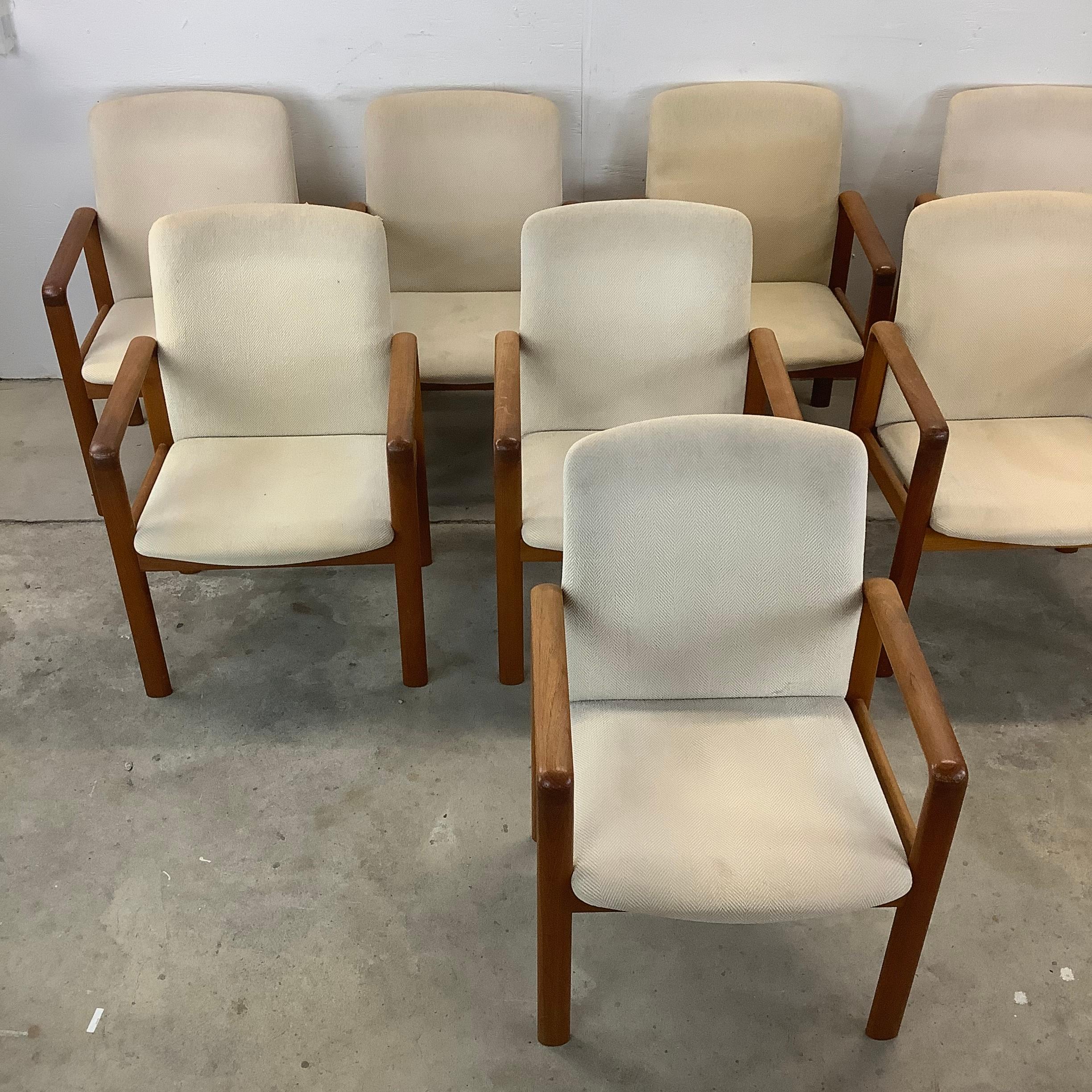 This matching Set of Eight Scandinavian Modern Teak Armchairs by Jesper Furniture is a stunning ensemble that embodies the essence of Danish design excellence. Crafted with precision and care, these armchairs are not just pieces of furniture;