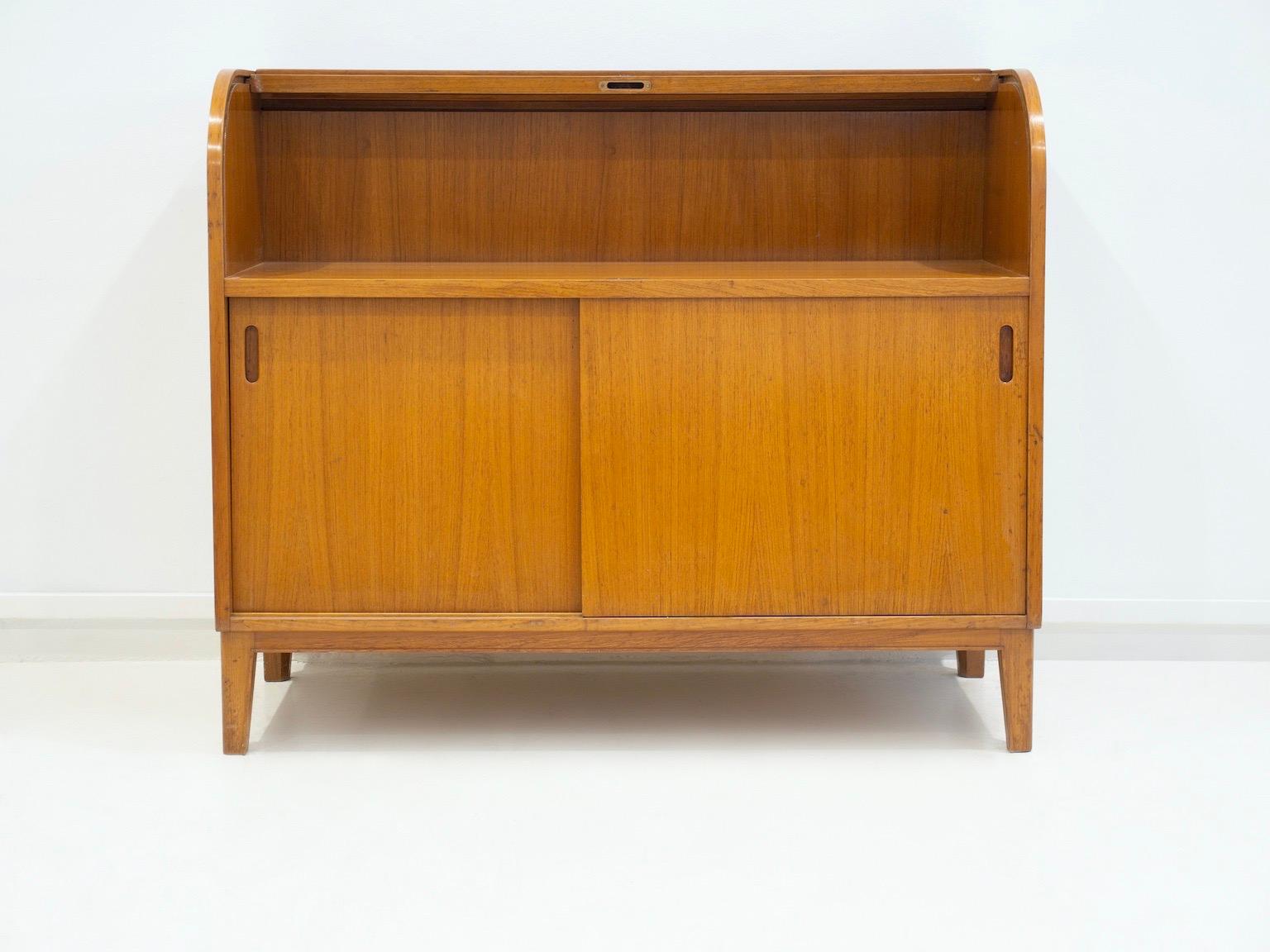 Swedish Scandinavian Modern Teak Cabinet with Sliding Doors and Roll-up Flap For Sale