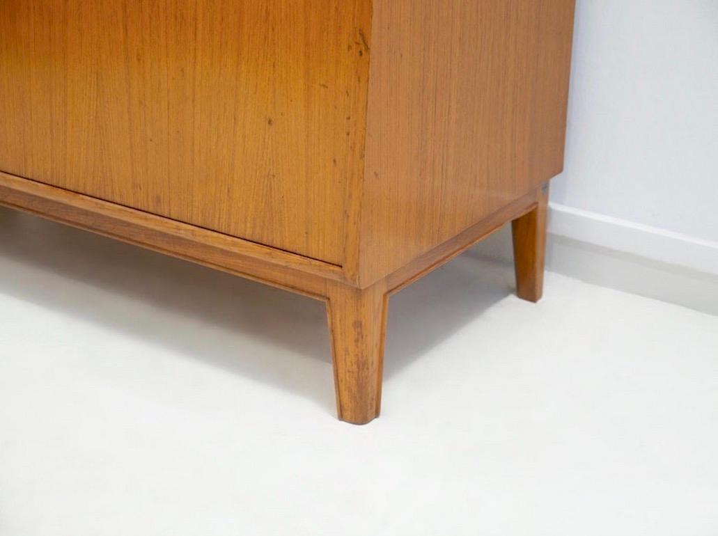 Scandinavian Modern Teak Cabinet with Sliding Doors and Roll-up Flap For Sale 1