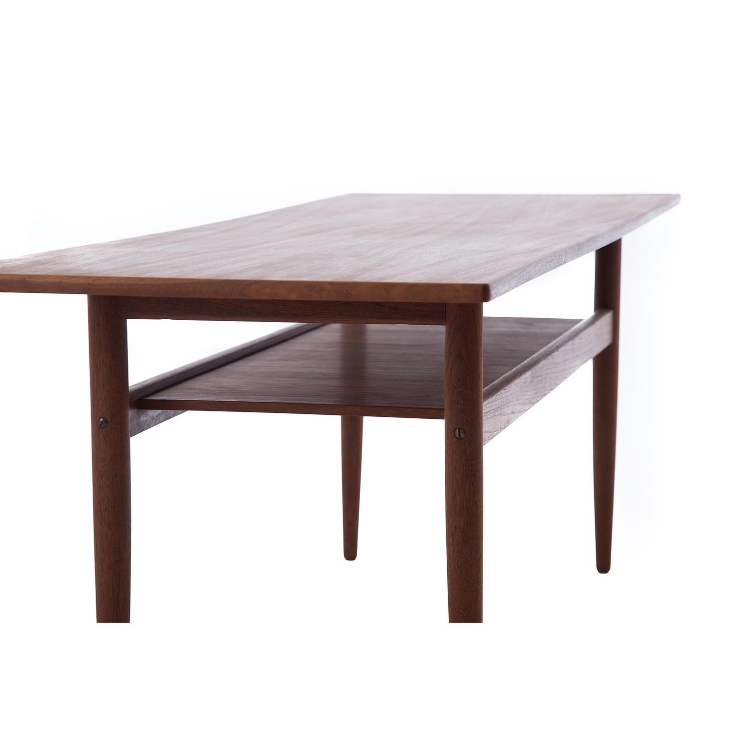 20th Century Scandinavian Modern Teak Coffee Table with Turned Legs & Solid Shelf