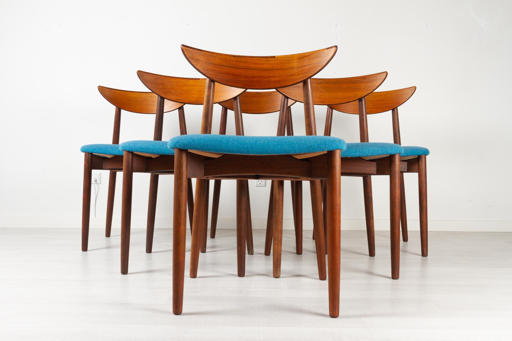 Scandinavian Modern teak dining chairs by Harry Østergaard 1960s, Set of 6
Stunningly elegant set of six Danish modern dining chairs with the iconic wide 