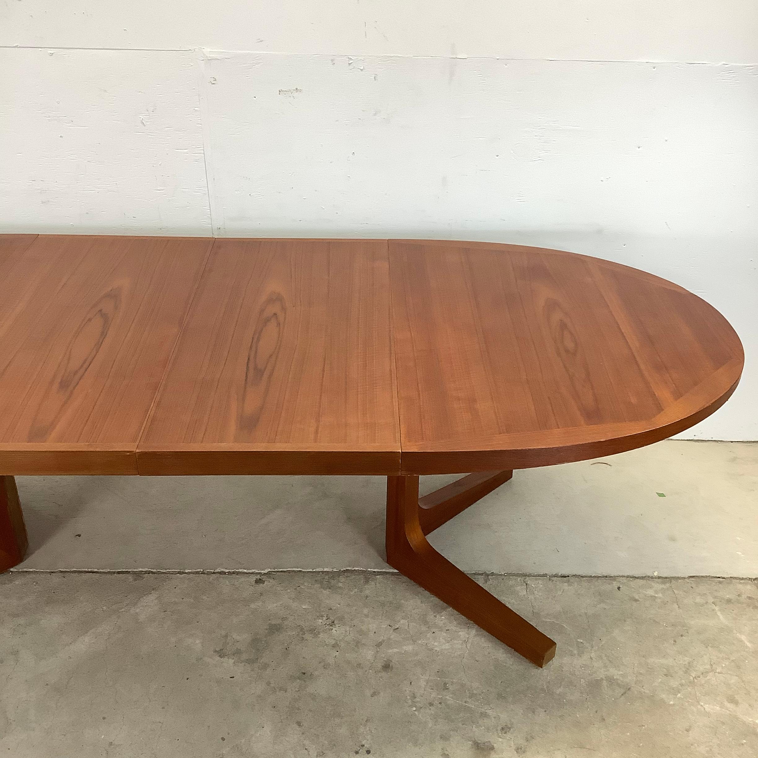 Scandinavian Modern Teak Dining Table With Two Leaves by Dyrlund 6