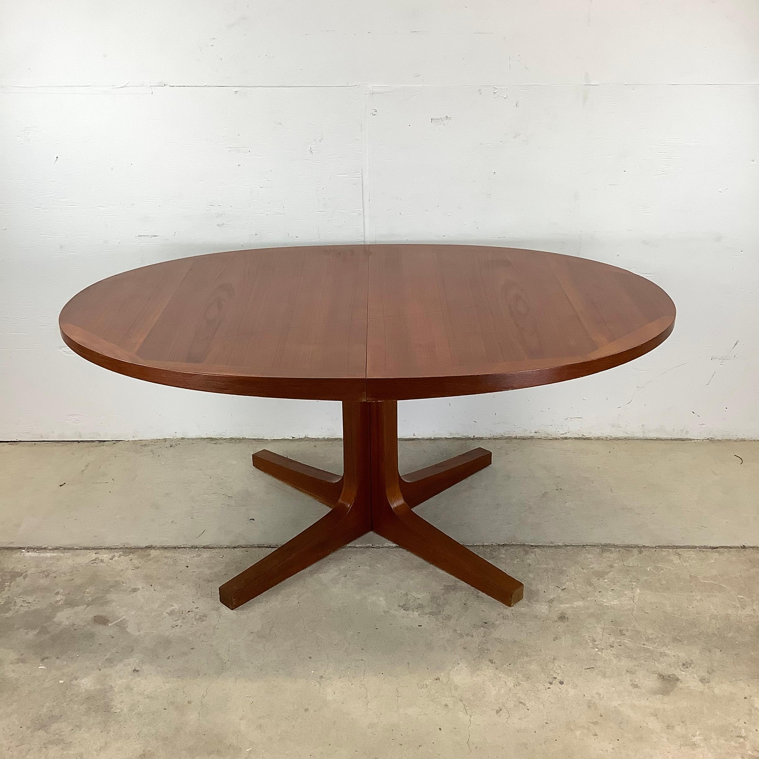 **Vintage Oval Teak Dining Table by Dyrlund – Danish Modern Elegance With Functional Versatility**  

Bring the timeless beauty of Scandinavian design into your dining space with this **vintage oval teak dining table by Dyrlund**, crafted in