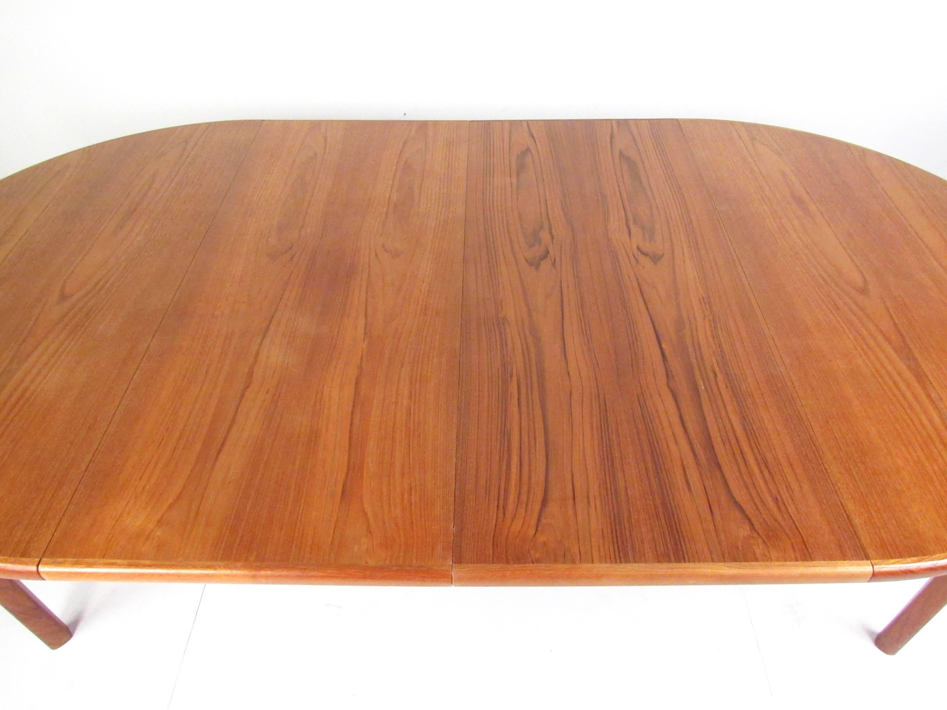 Scandinavian Modern Teak Dining Table with Two Leaves 5
