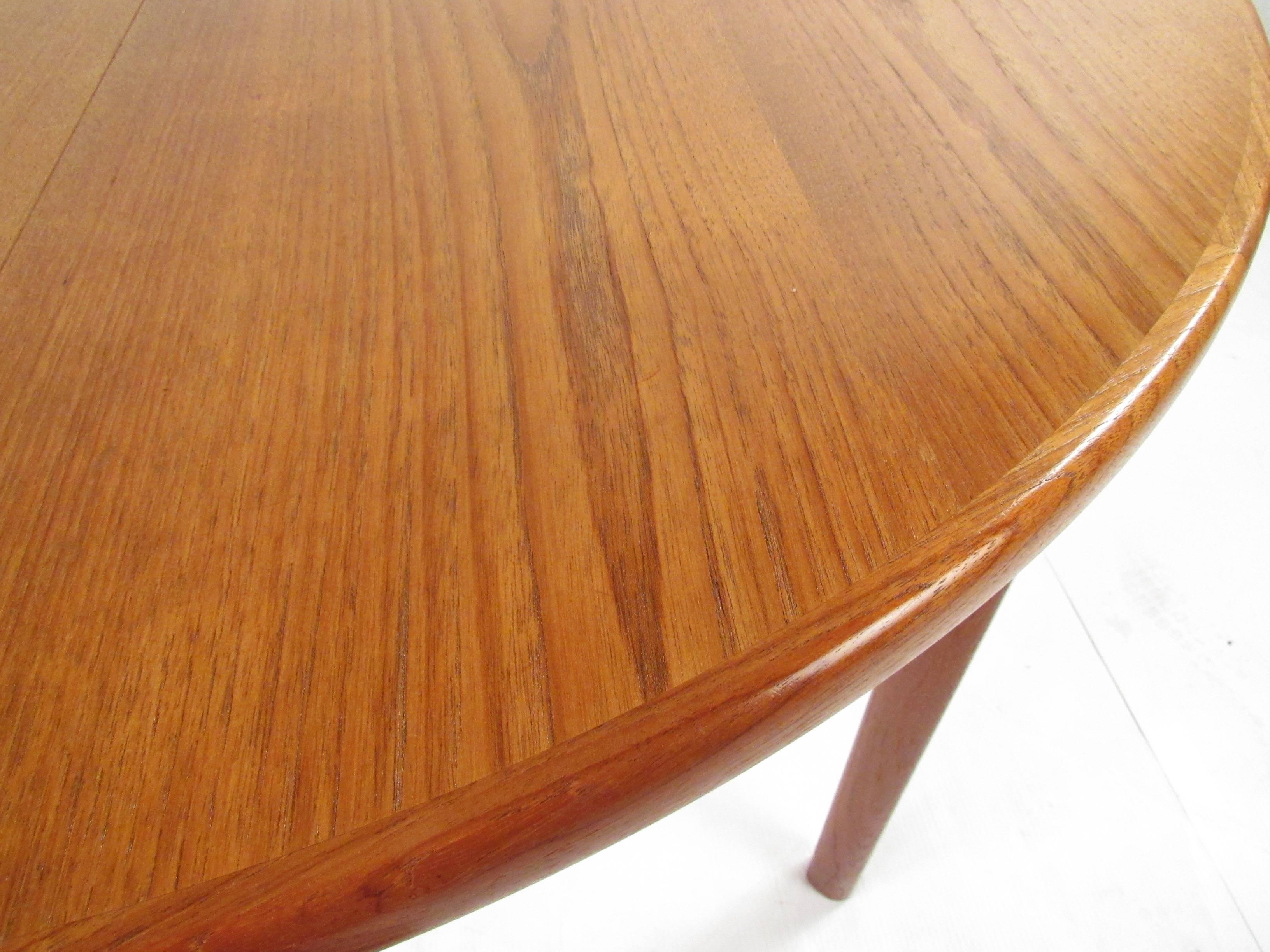 20th Century Scandinavian Modern Teak Dining Table with Two Leaves