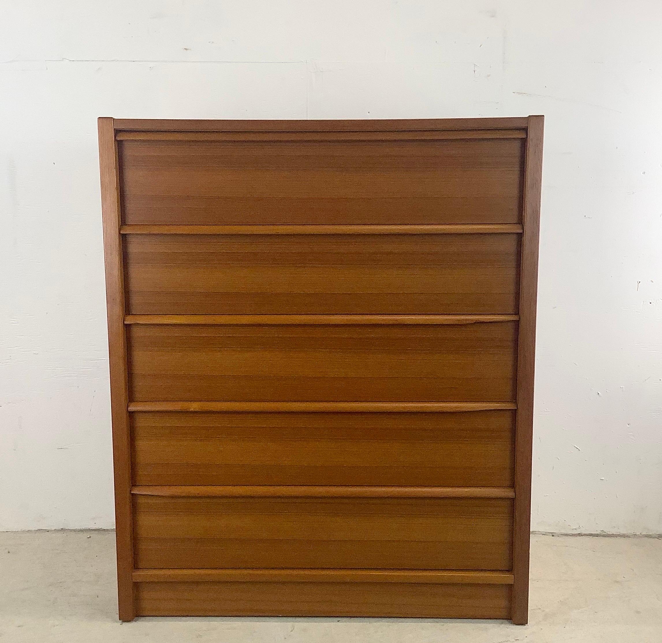 Quality Danish Modern highboy dresser from New Furniture of Denmark adds iconic Scandinavian Modern design to any setting. The five drawer bedroom dresser offers spacious stacked drawers for ample storage in a simple yet striking organic modern