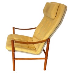 Retro Scandinavian modern teak leather safari lounge chair yellow
