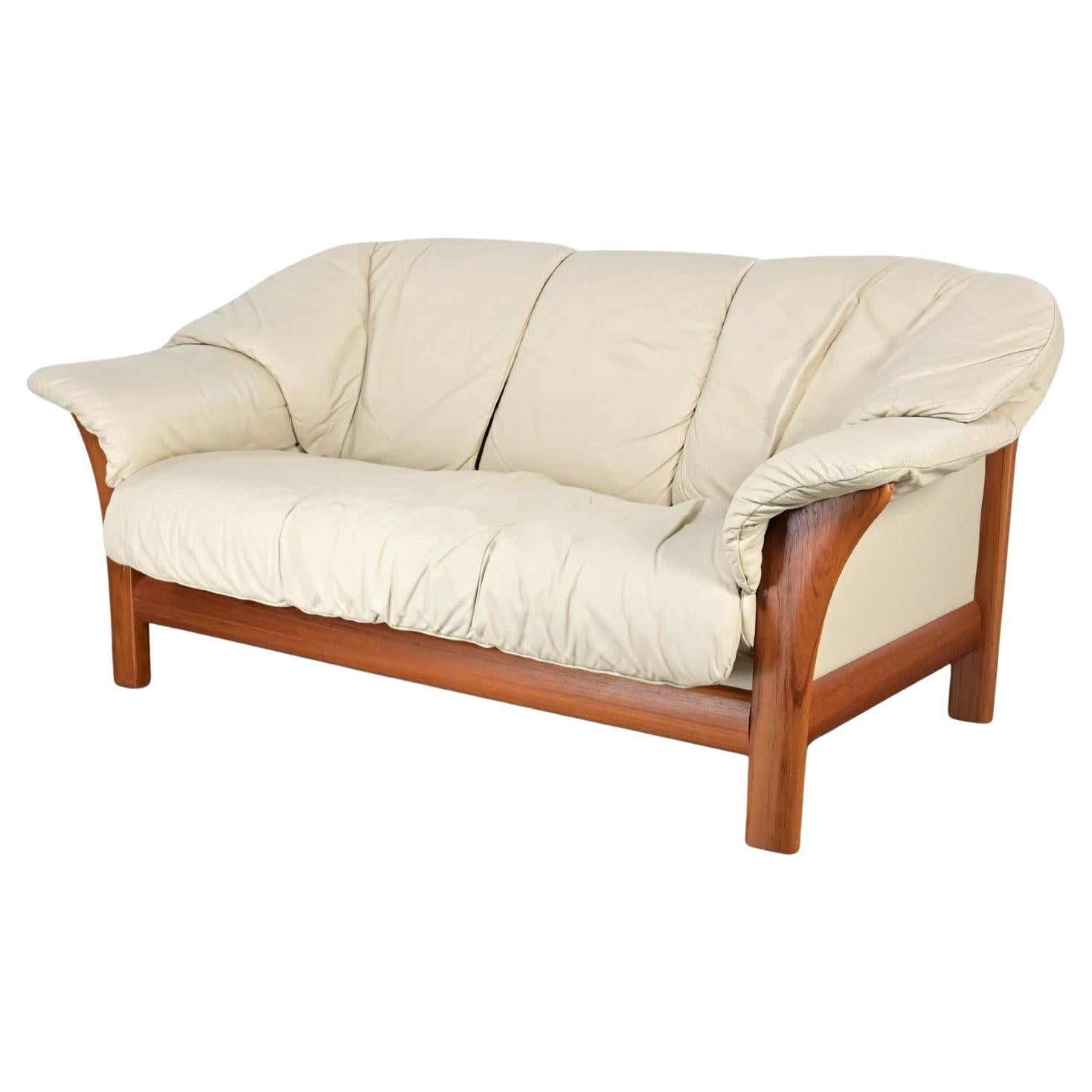 Scandinavian Modern Teak & Off White Leather Small Sofa Attributed to Ekornes For Sale