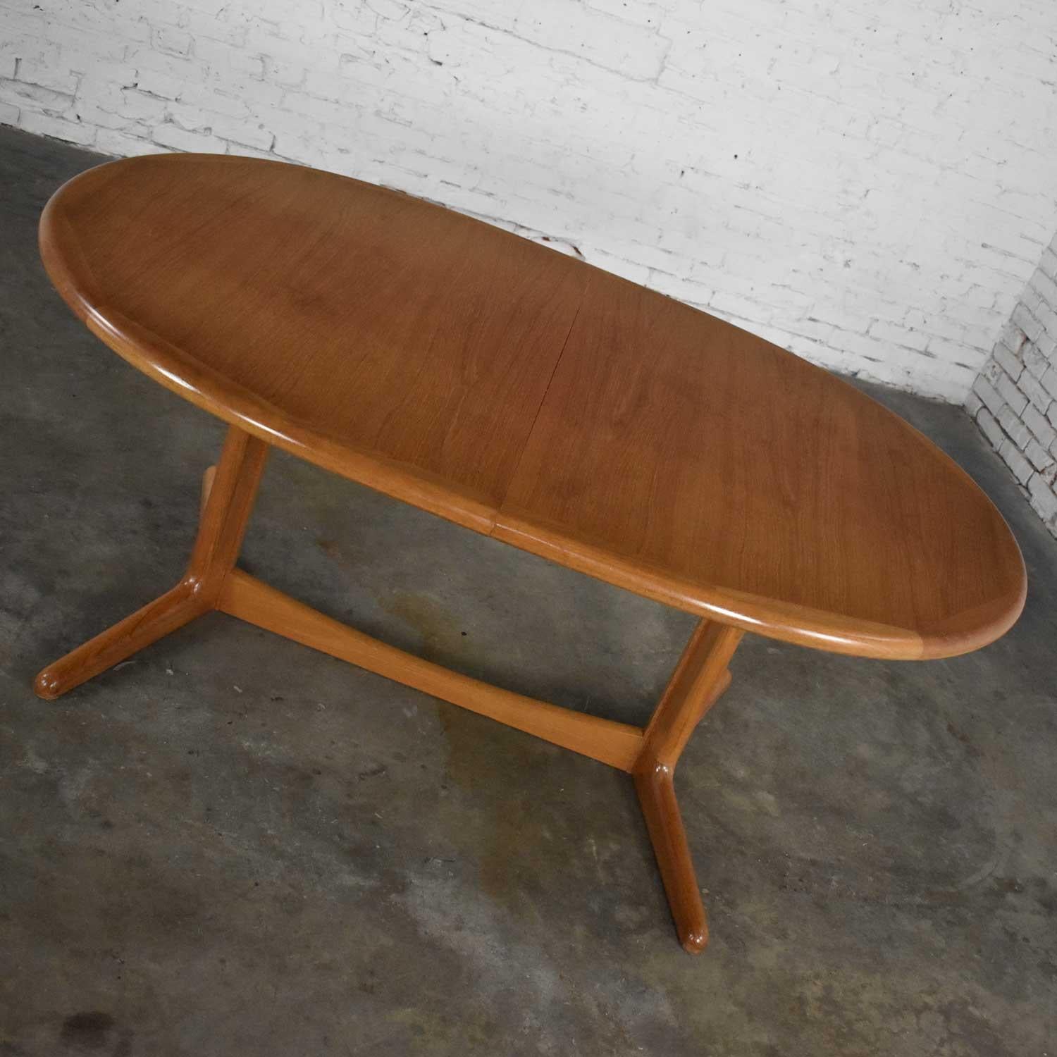 20th Century Scandinavian Modern Teak Oval Dining Table with Integral Leaf Style Dyrlund