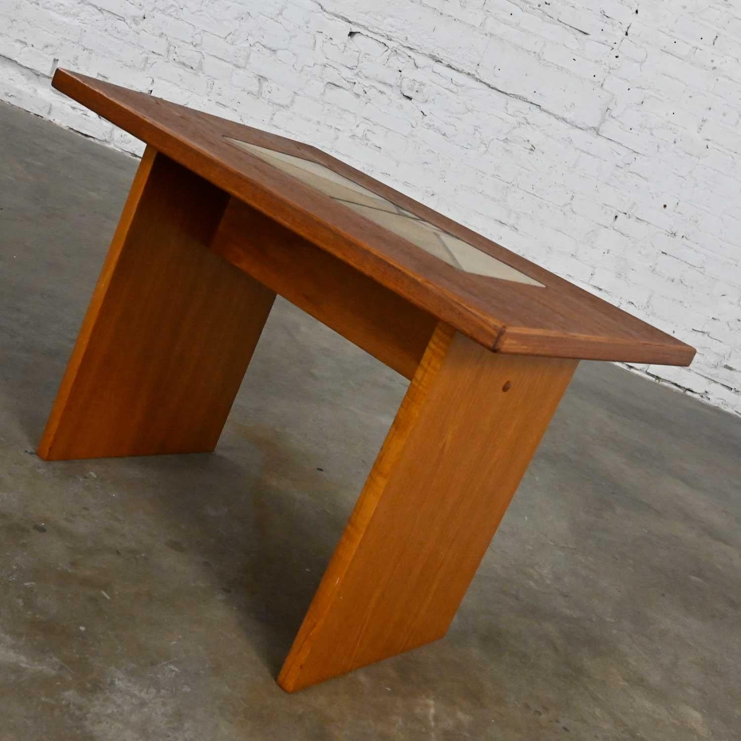 Gorgeous Scandinavian Modern teak rectangular side table or end table with unique tile insert by Gangso Mobler. Beautiful condition, keeping in mind that this is vintage and not new so will have signs of use and wear. The top has been stained and