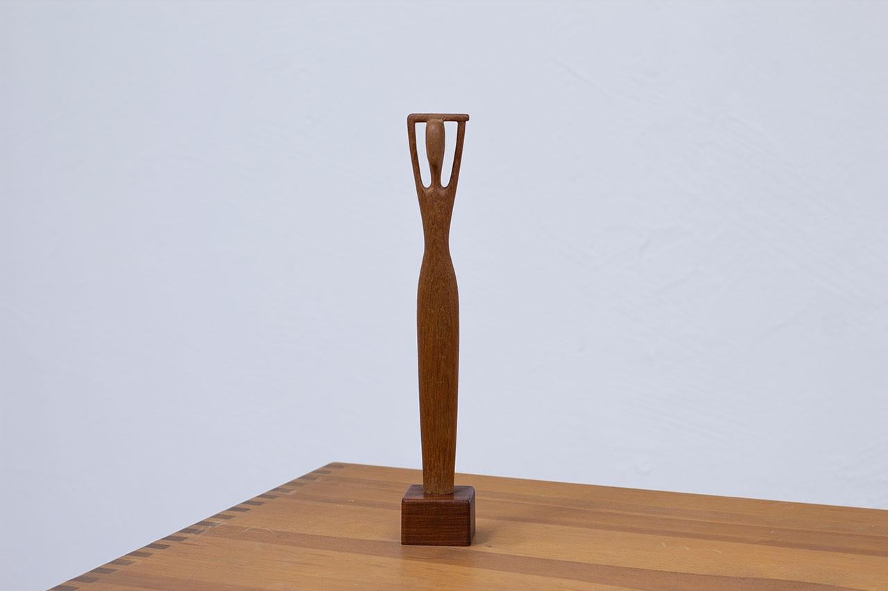 Lovely teak sculpture by Swedish artist Johnny Mattsson.
The figurative sculpture is in a shape of a woman and is entitled 