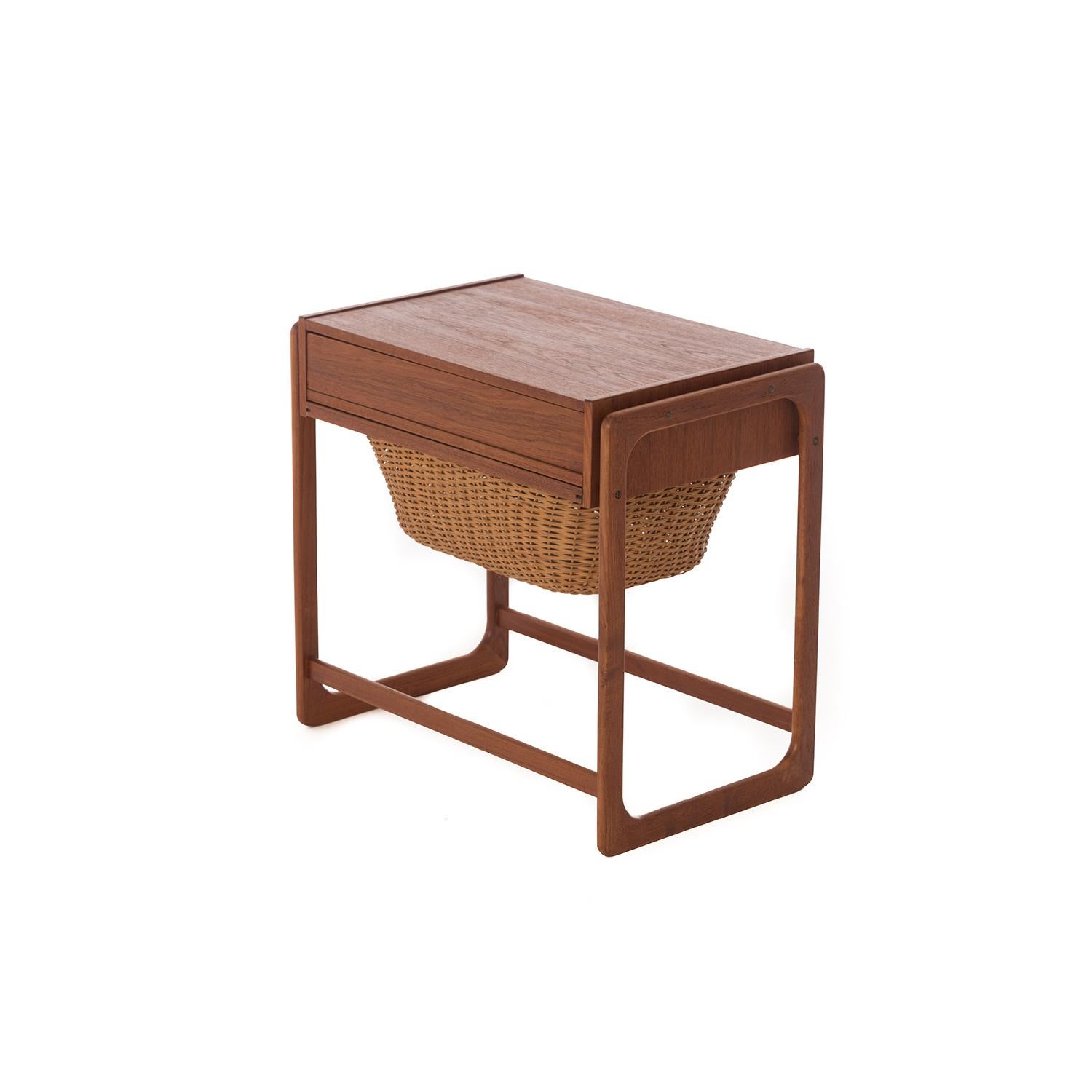 This lovely vintage teak sewing table features a pull out basket (for piece-work) and a compartmentalized drawer to store the implements.  If you aren't a sewer don't despair, the re-purposing opportunities are endless.  Old growth teak with a