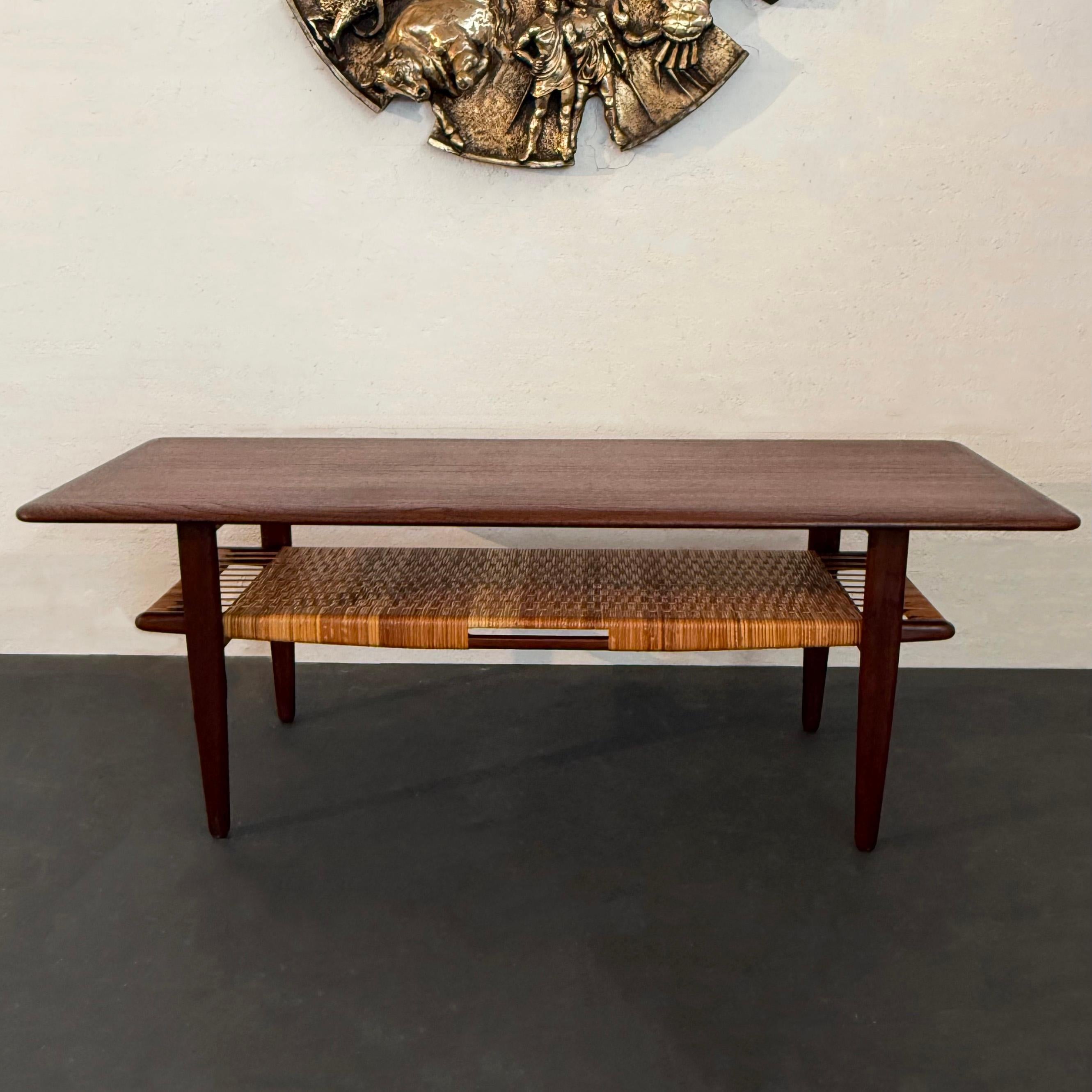 Scandinavian Modern Tiered Teak And Cane Coffee Table By Kurt Østervig In Good Condition For Sale In Brooklyn, NY