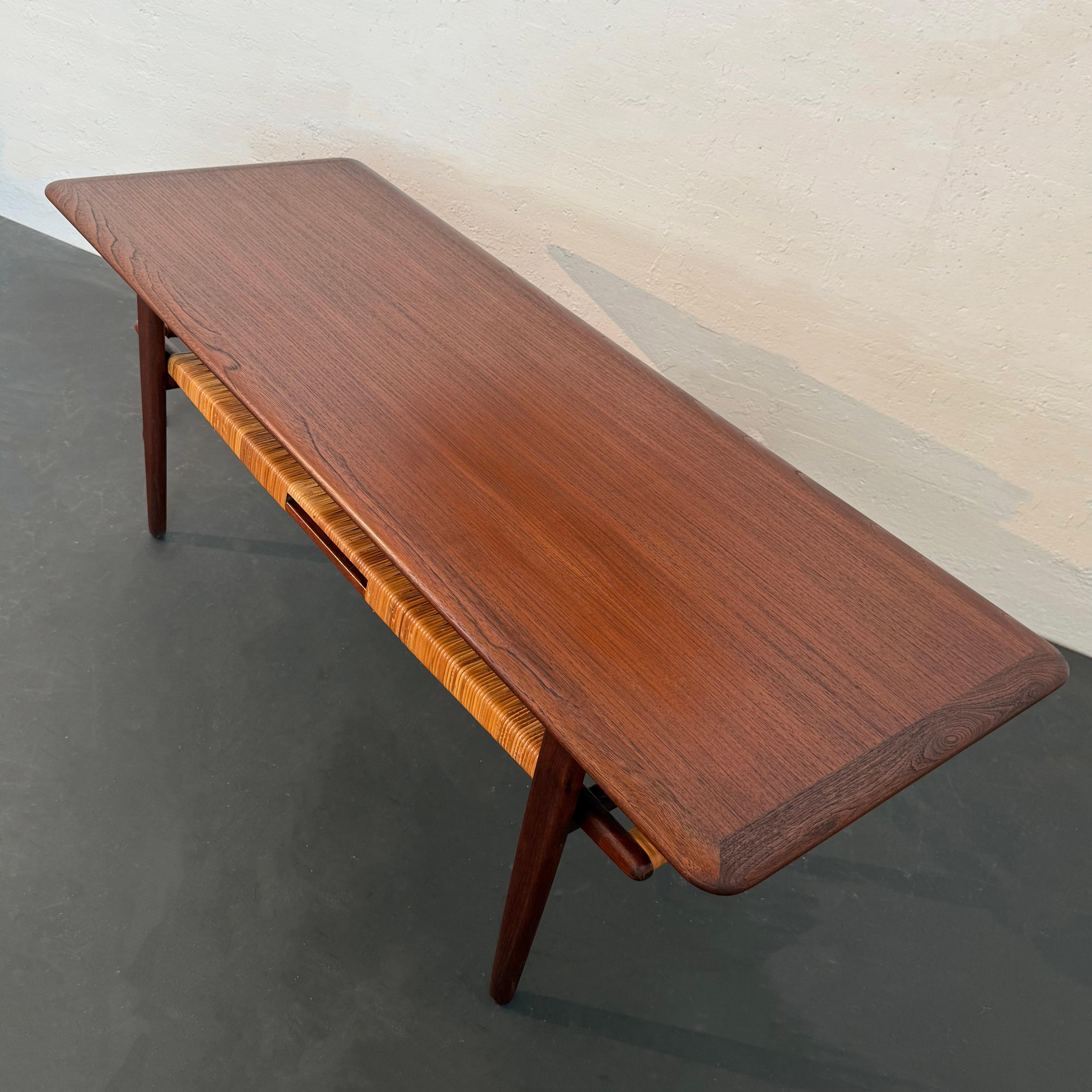 20th Century Scandinavian Modern Tiered Teak And Cane Coffee Table By Kurt Østervig For Sale