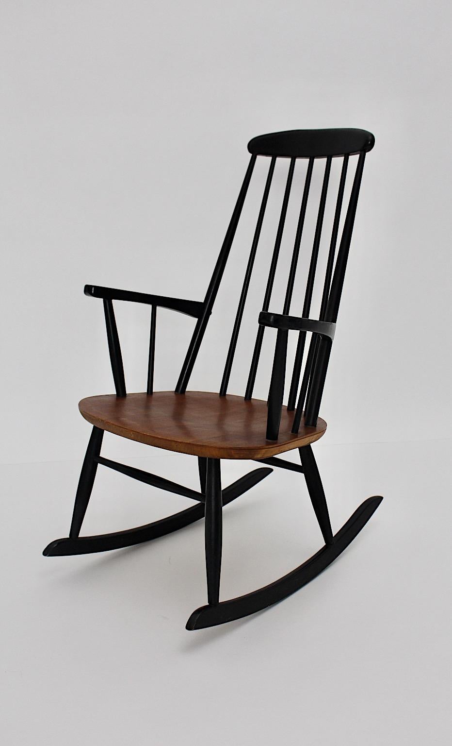 Scandinavian Modern Vintage Black Teak Rocking Chair Ilmari Tapiovaara, 1950s In Good Condition For Sale In Vienna, AT