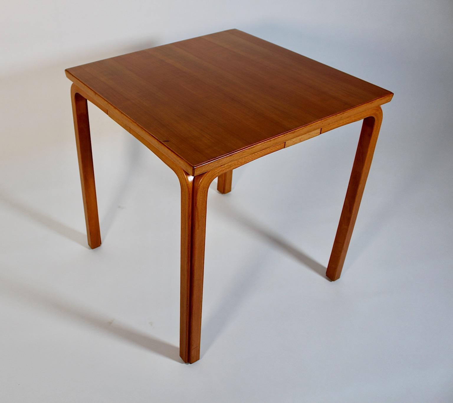 Scandinavian Modern vintage square like form side table from
plywood and birch dining table or side table by Alvar Aalto
designed circa 1946 Finland manufactured circa 1960.
A wonderful squared dining table or side table from birch while
the Y leg