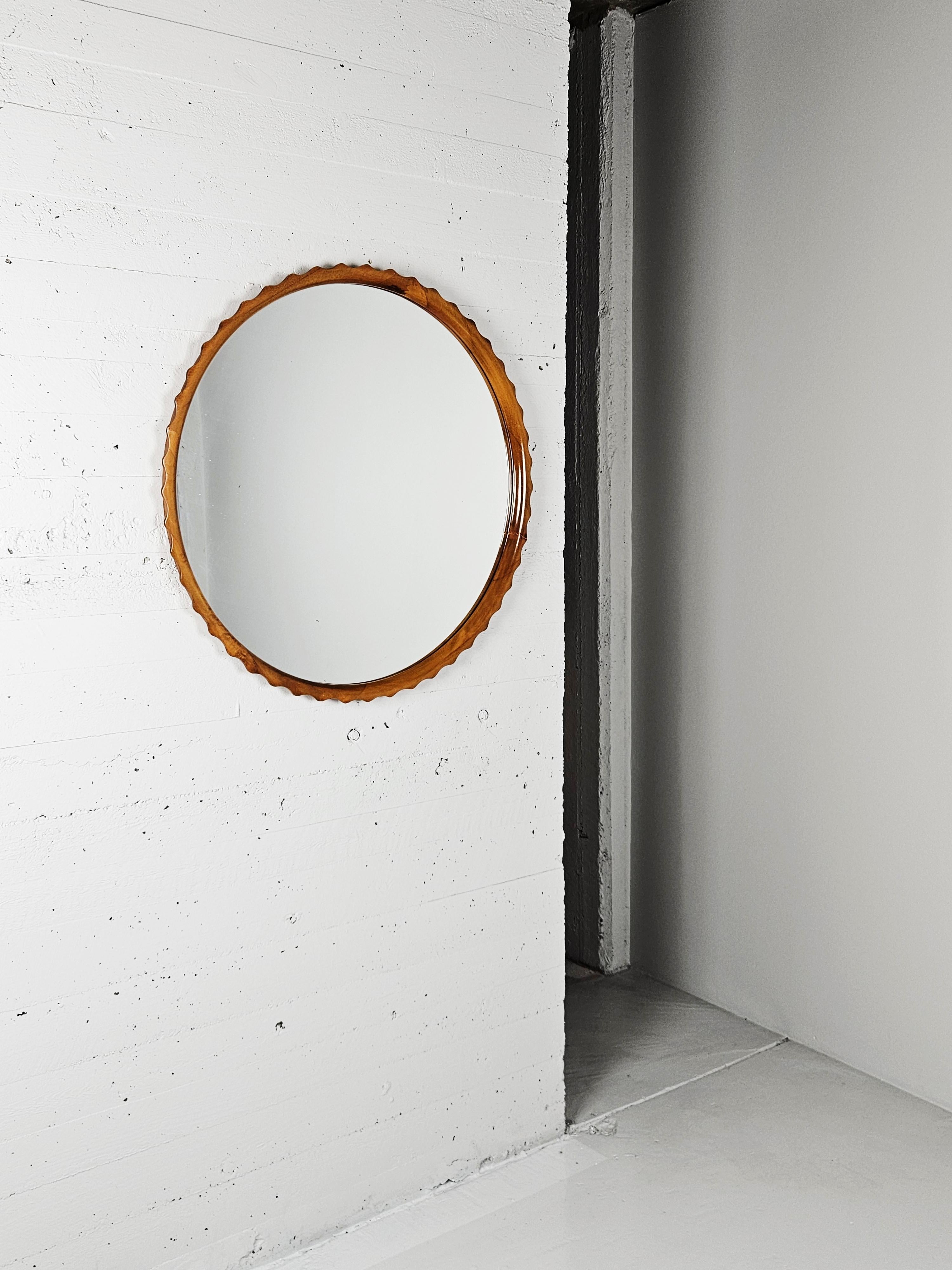 Big and rare anonymous wall mirror. Made in Sweden during the 1940s. 

Beautiful craftmanship. 

Made in beech.
