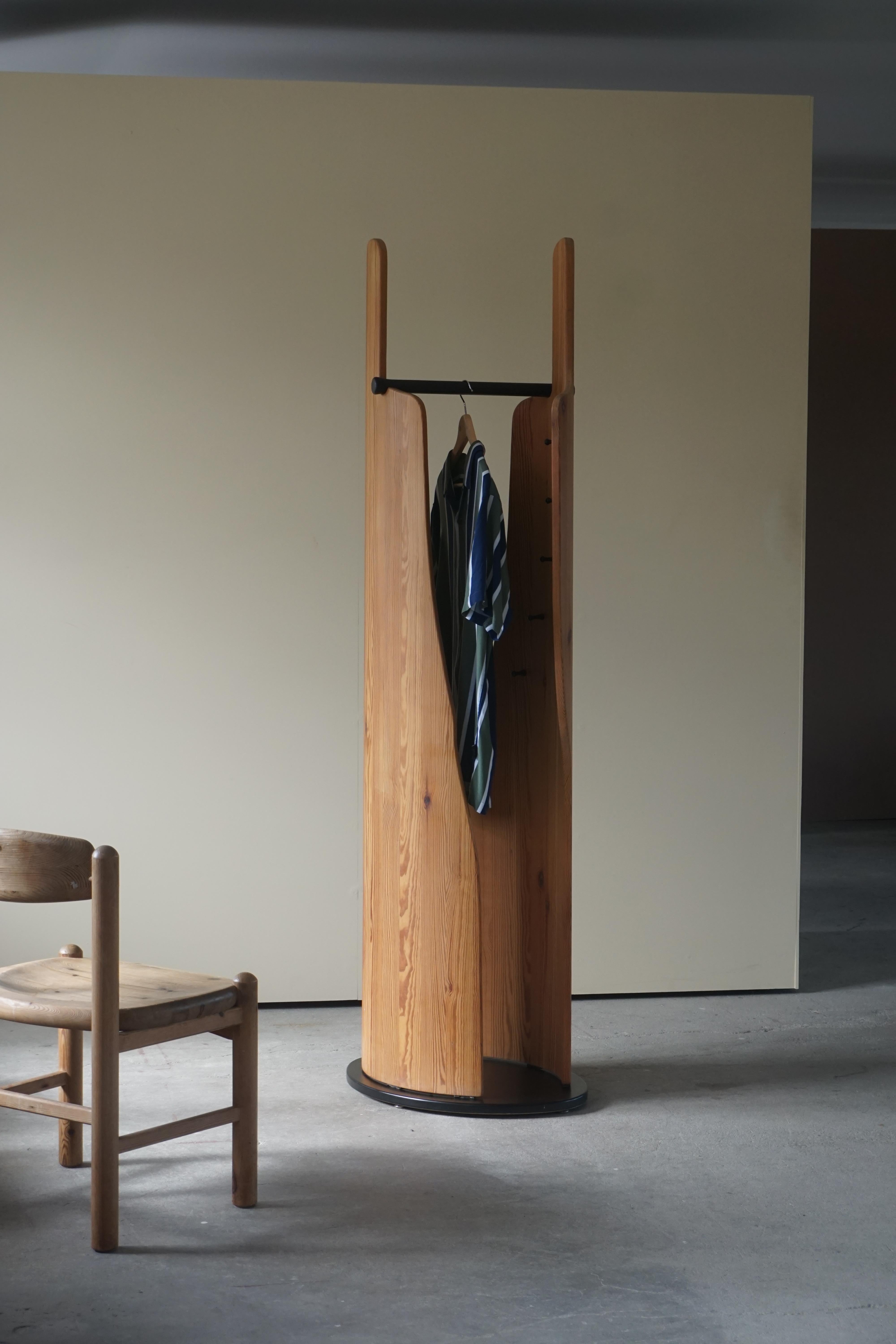 Scandinavian Modern wardrobe in solid oregon pine, made by Peter Opsvik for Cylindra AS, Norge. 1980s. 
A nice sculptural design.