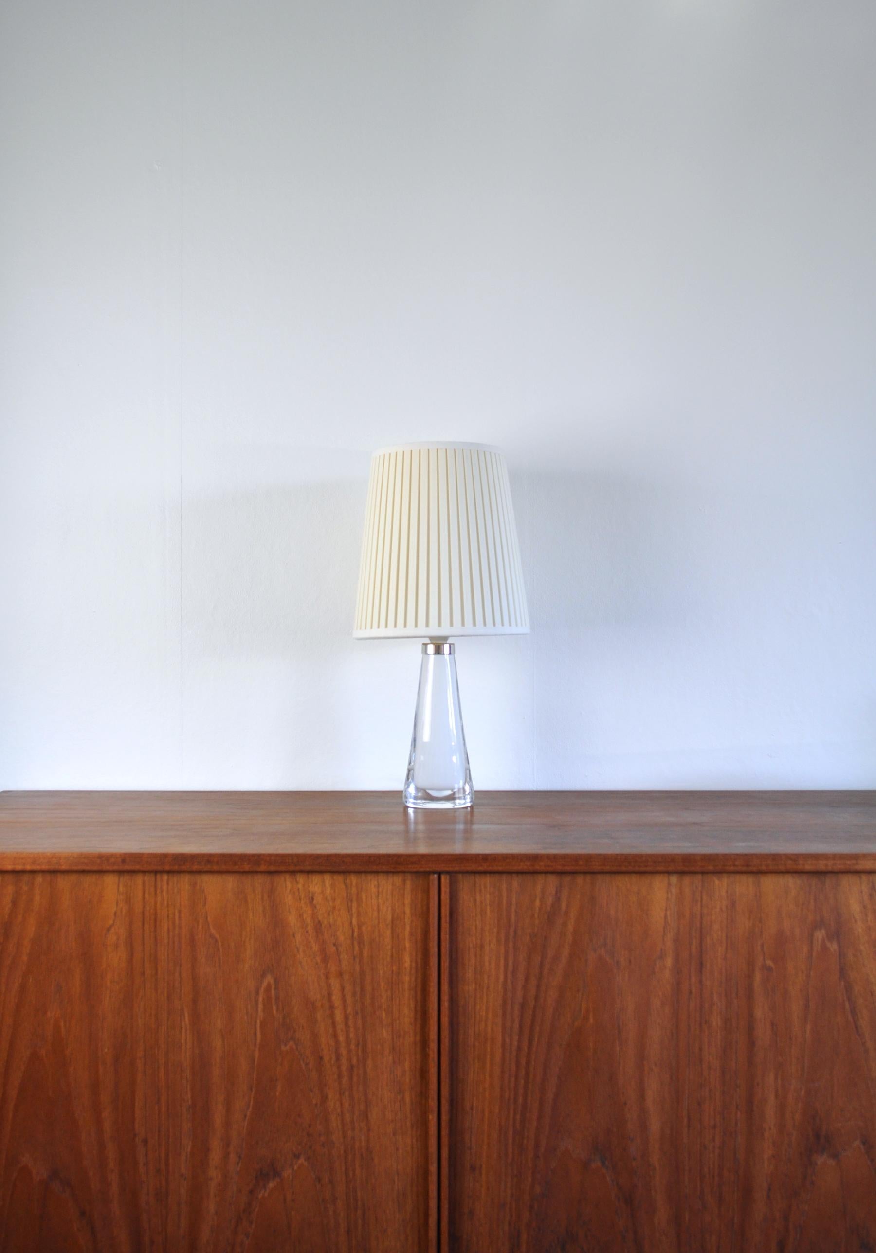 White glass table lamp by Carl Fagerlund for Orrefors, Sweden, 1960s.
Engraved in the bottom 