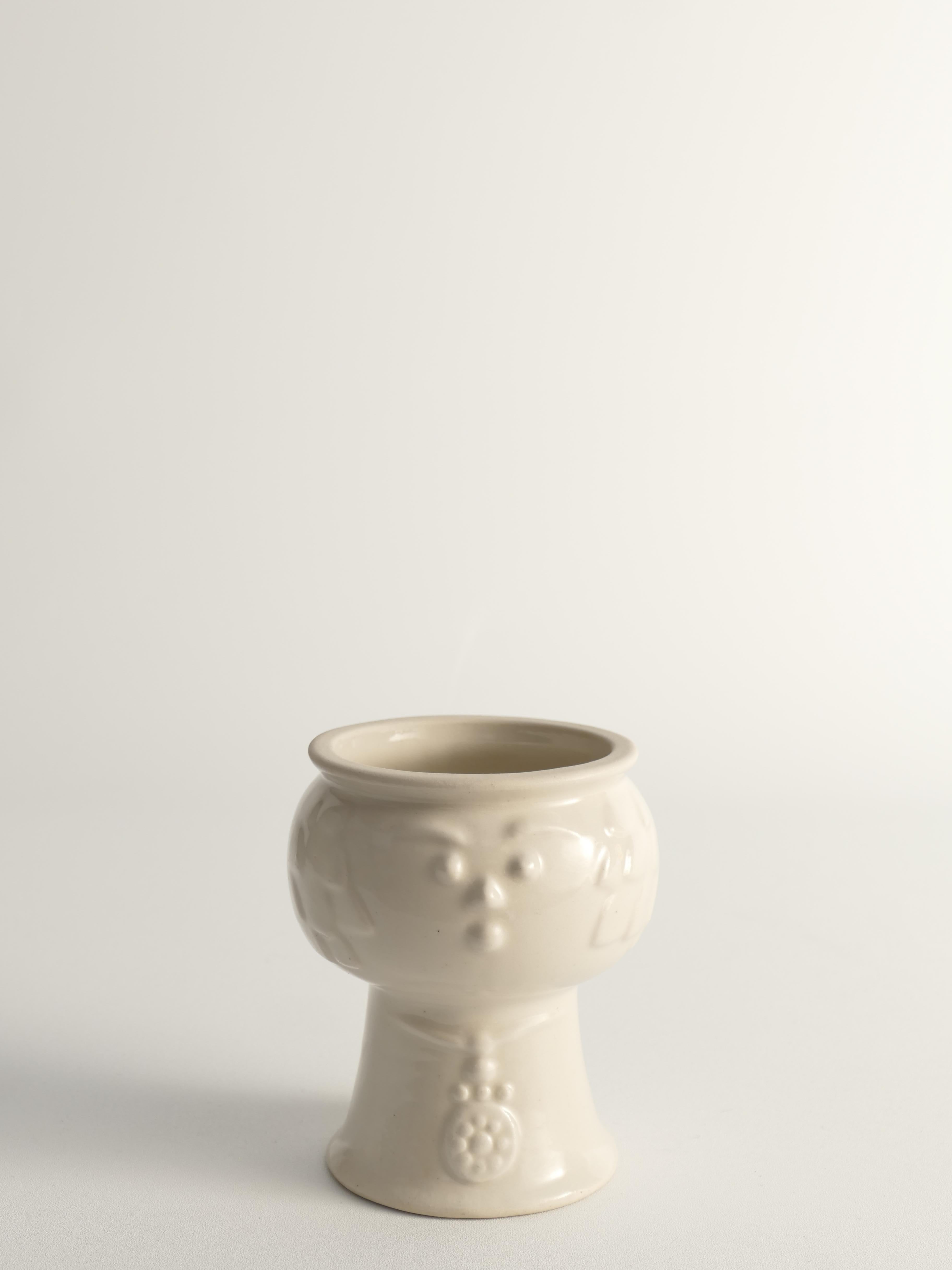This sculptural vase, named 