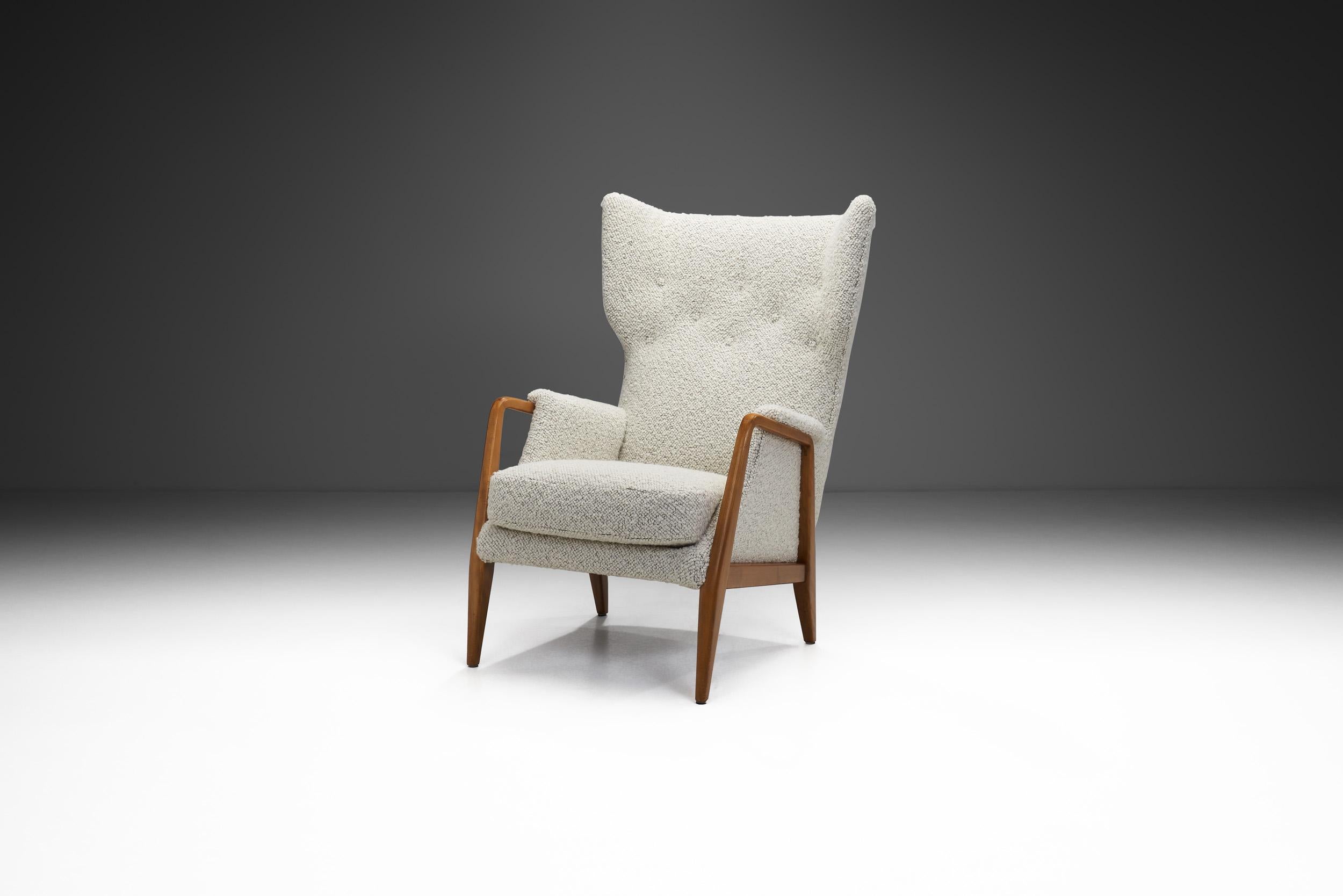 Scandinavian Modernism can be visually described by this beautiful wingback chair: sleek, organic and timeless. These attributes are met with high quality materials and the famous craftsmanship of Scandinavian cabinetmakers. This beautiful wingback